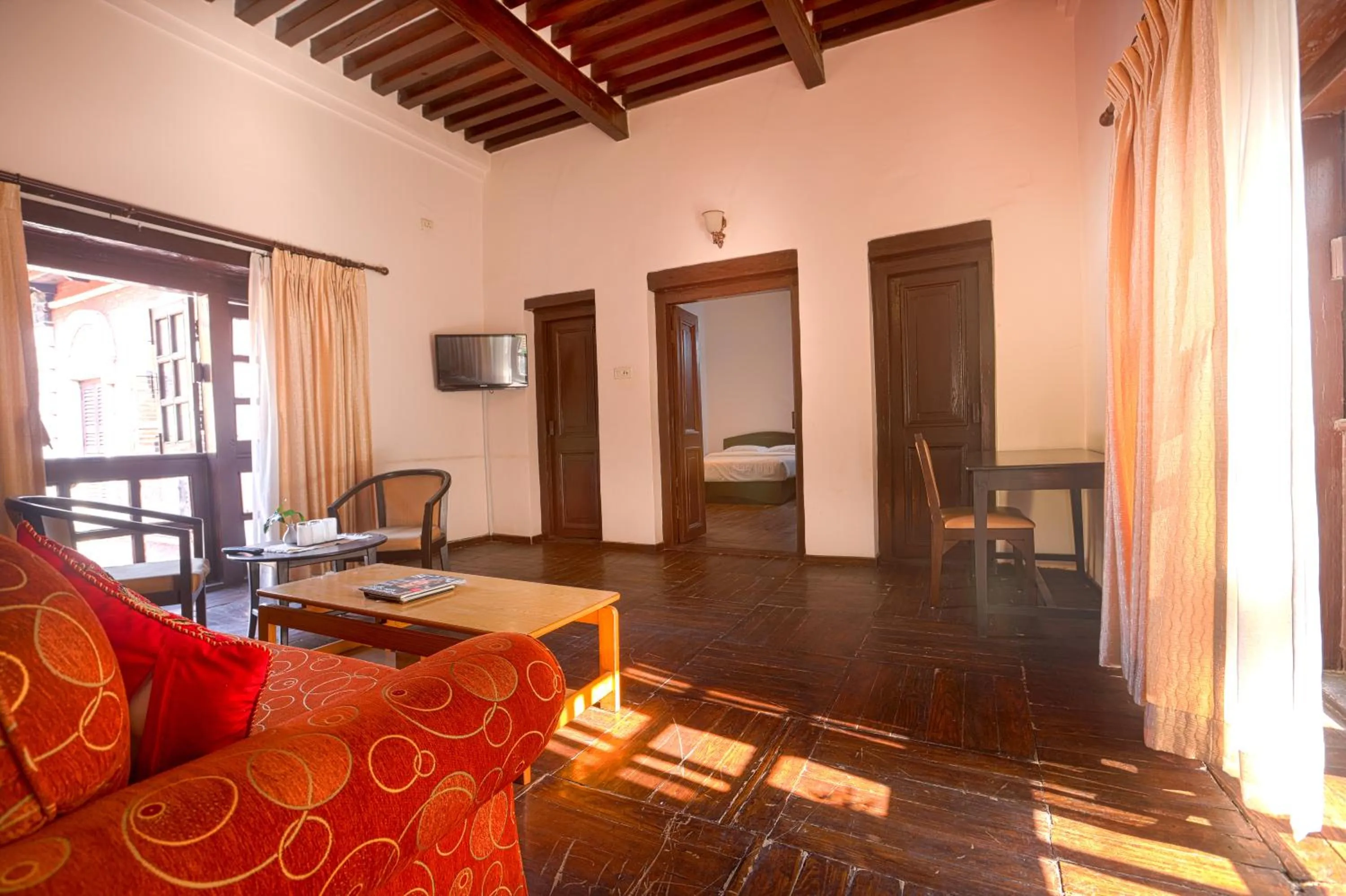 Communal lounge/ TV room in Hukum Darbar Restaurant & Hotel