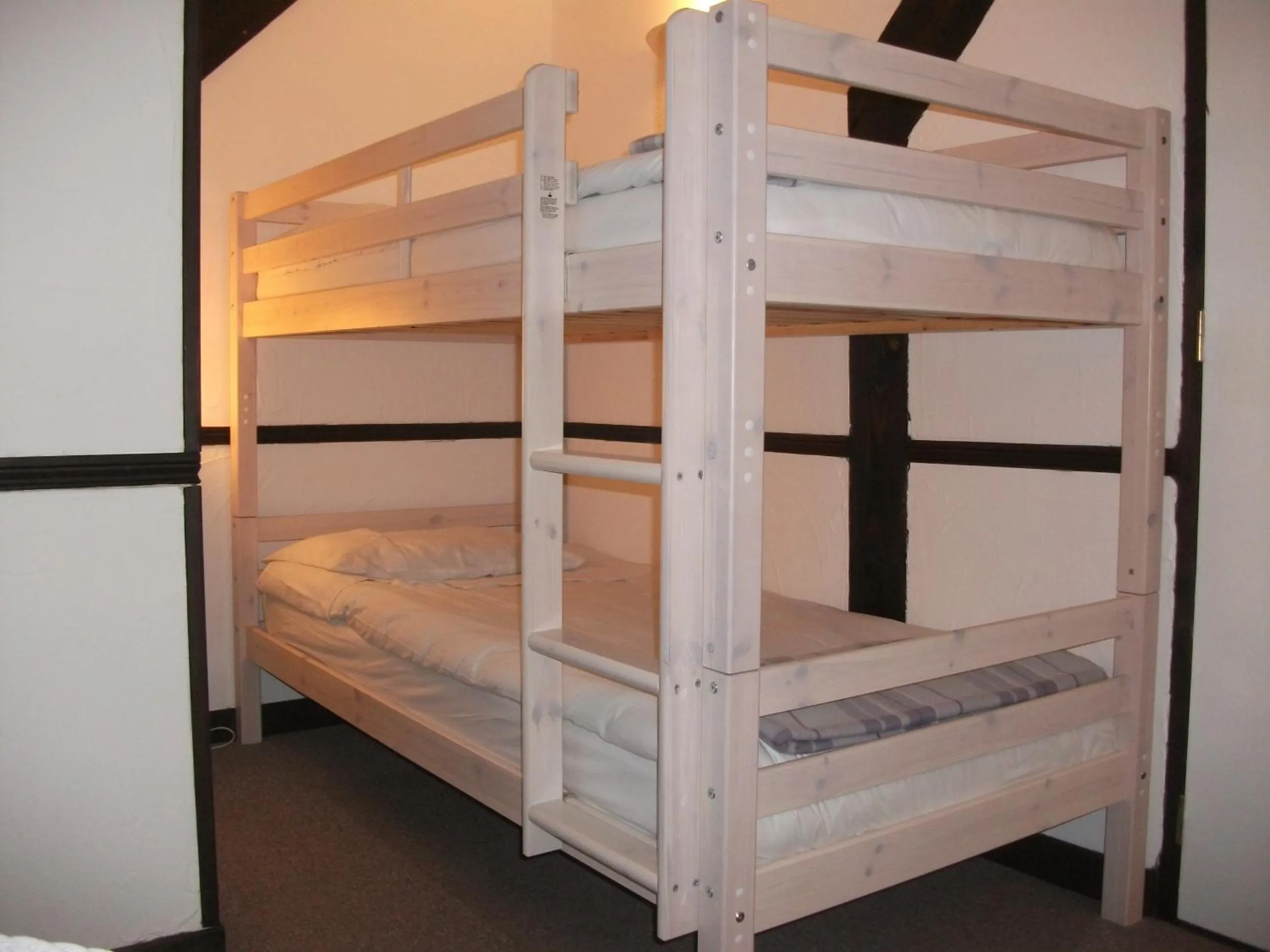 Decorative detail, Bed in Au Bon Accueil