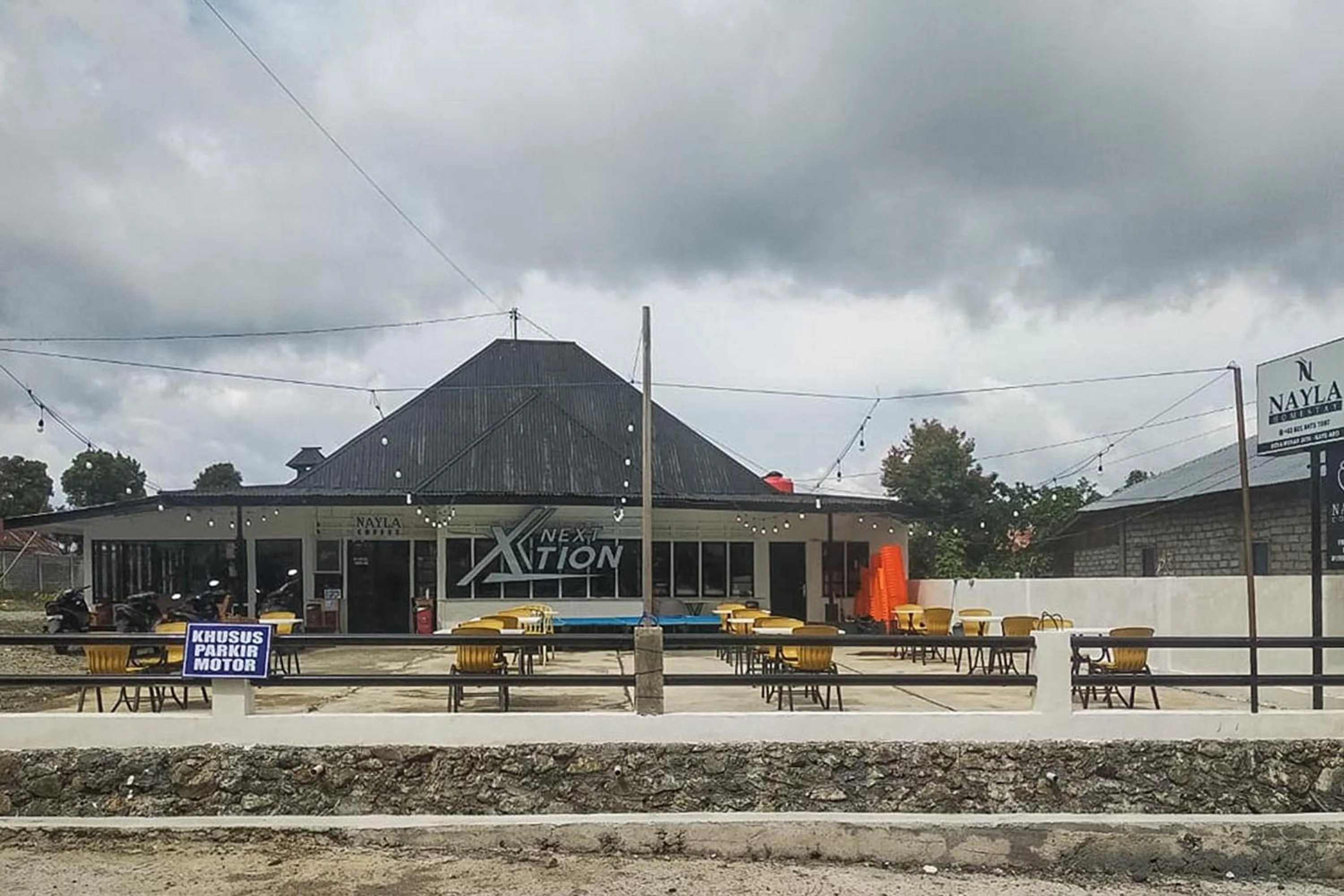 Facade/entrance in Nayla Homestay Jambi Mitra RedDoorz