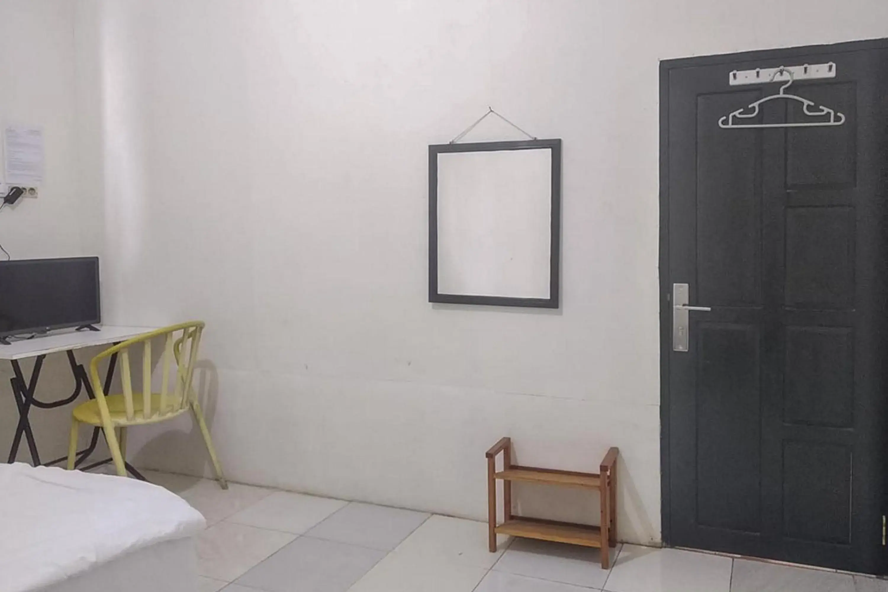 Bed in Nayla Homestay Jambi Mitra RedDoorz Bed in Nayla Homestay Jambi Mitra RedDoorz