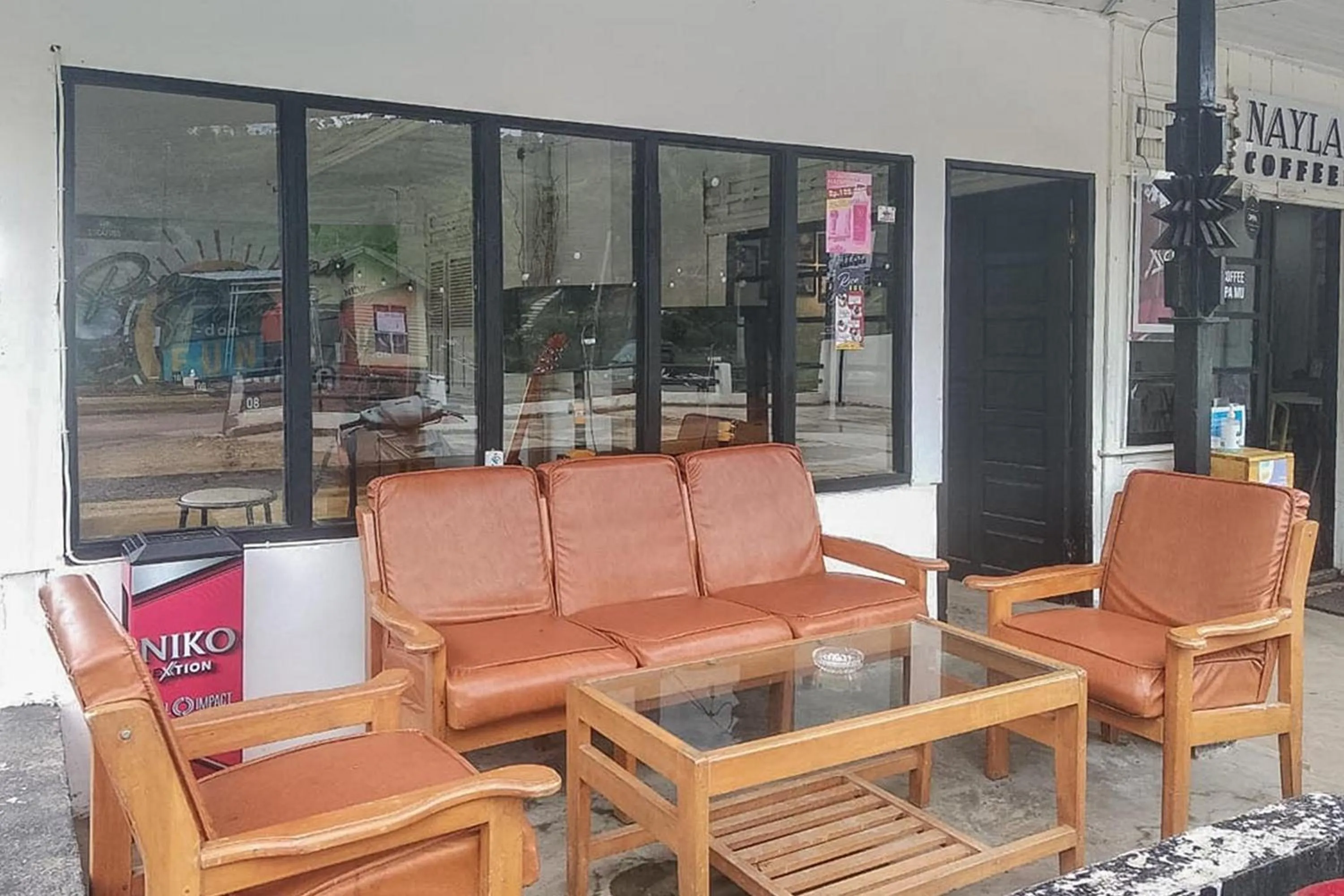 Seating area in Nayla Homestay Jambi Mitra RedDoorz