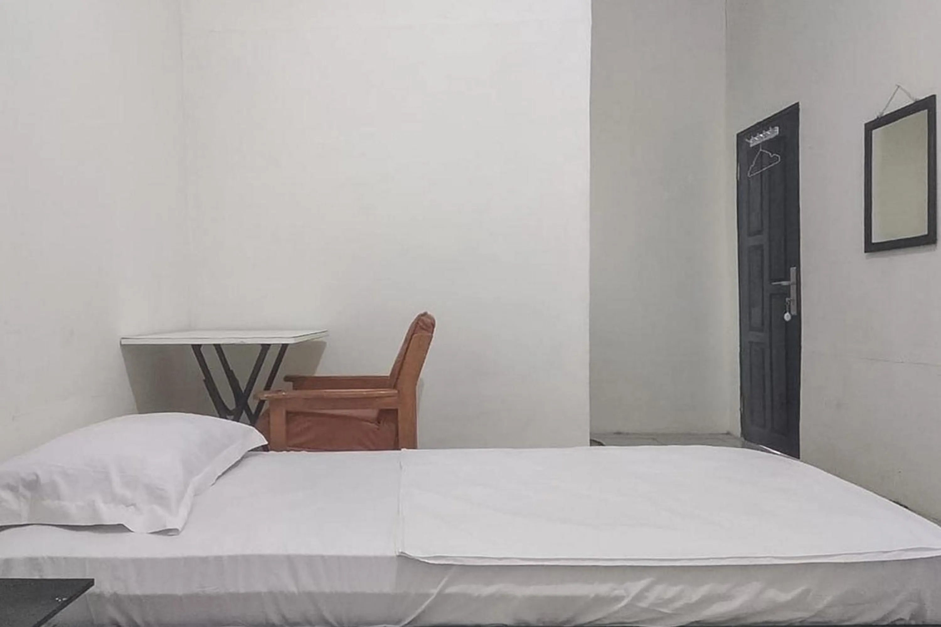 Bedroom, Bed in Nayla Homestay Jambi Mitra RedDoorz