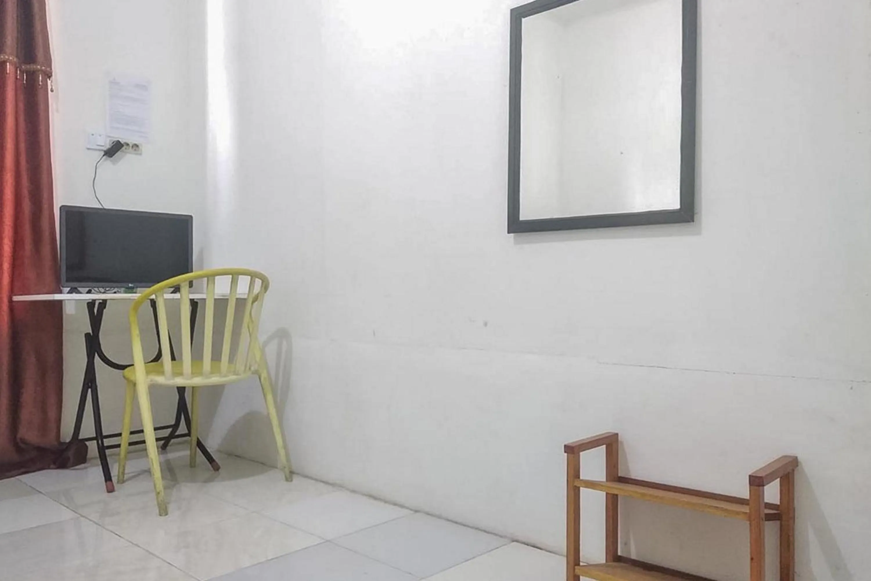 TV and multimedia in Nayla Homestay Jambi Mitra RedDoorz