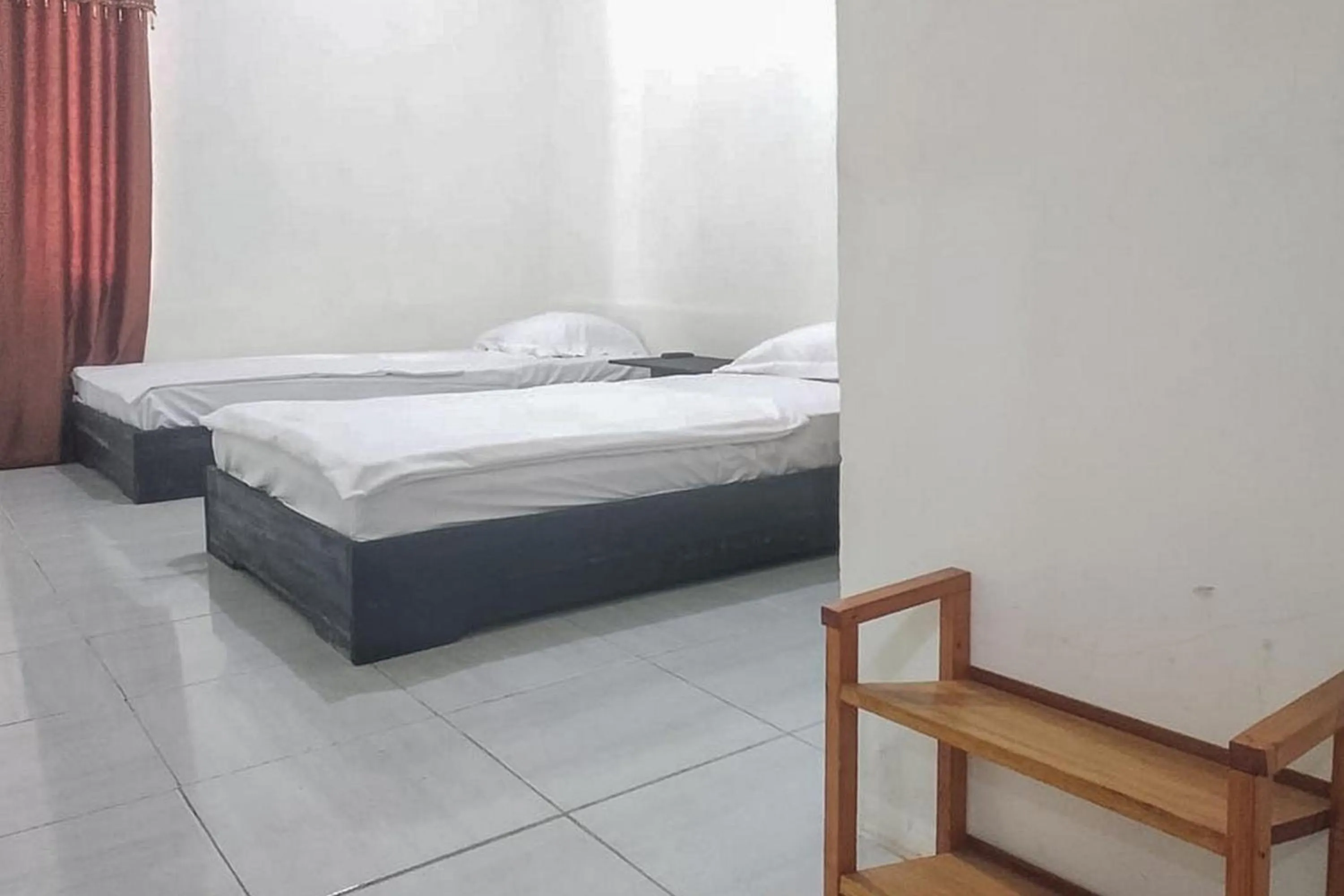 Bed in Nayla Homestay Jambi Mitra RedDoorz