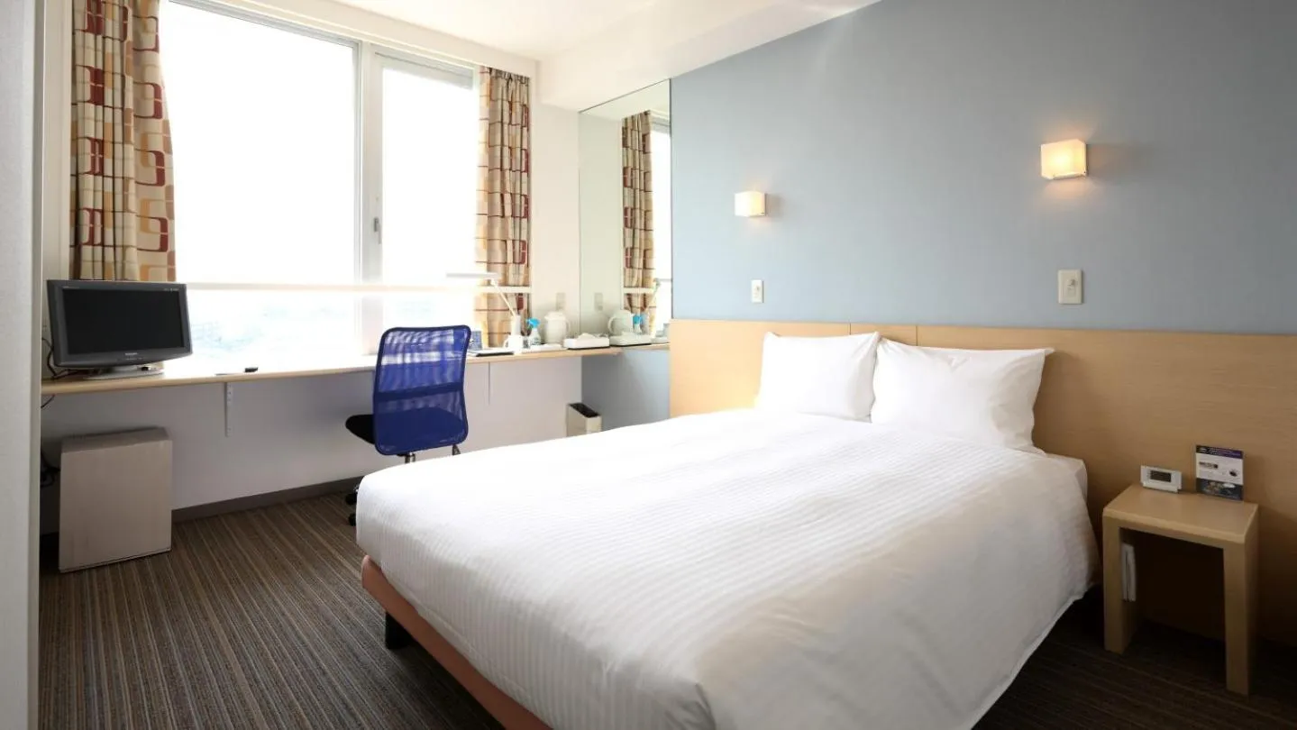 Bed in Smile Hotel Sendai Tagajyo