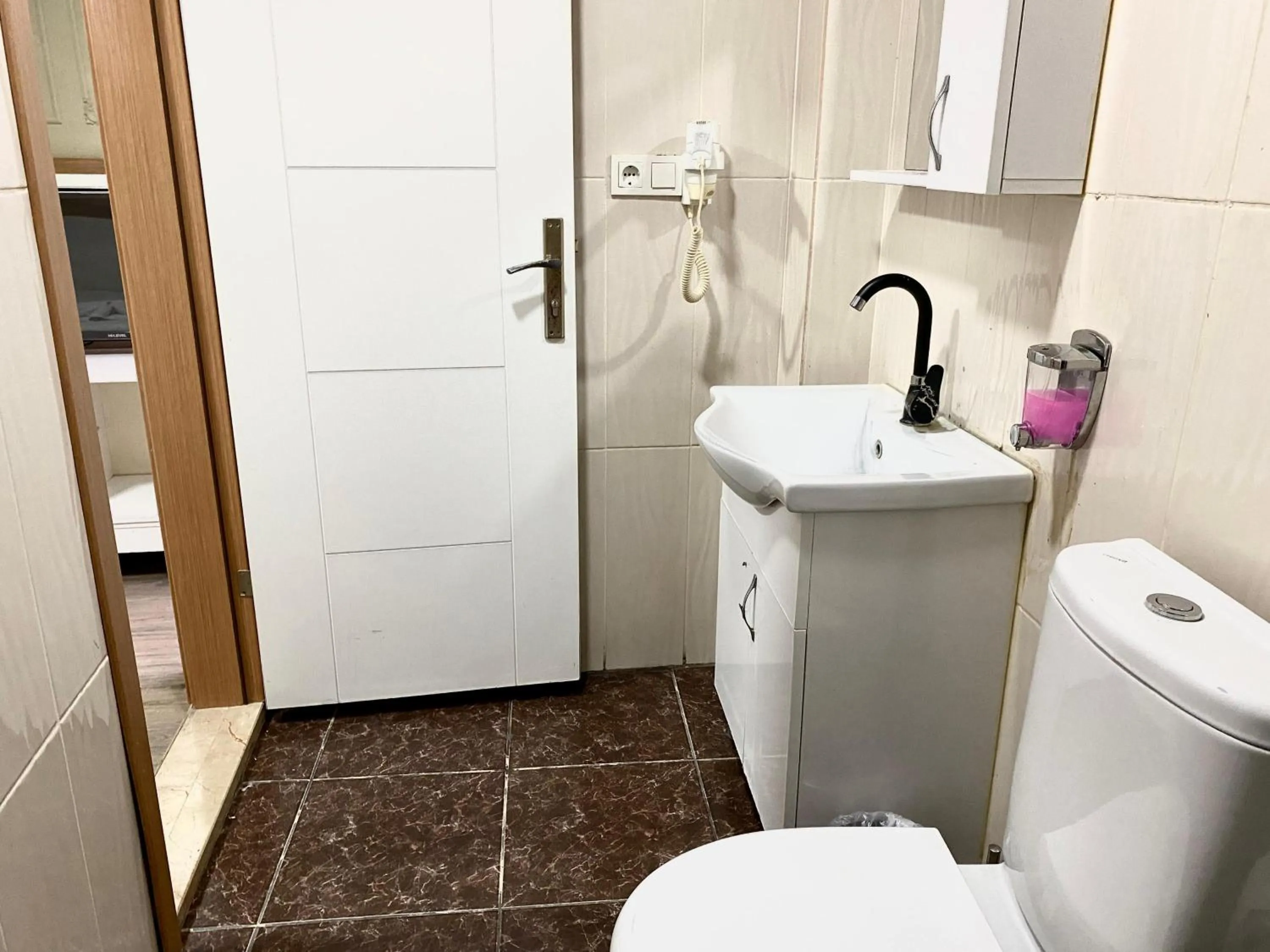 Toilet in Airport Best Hotel