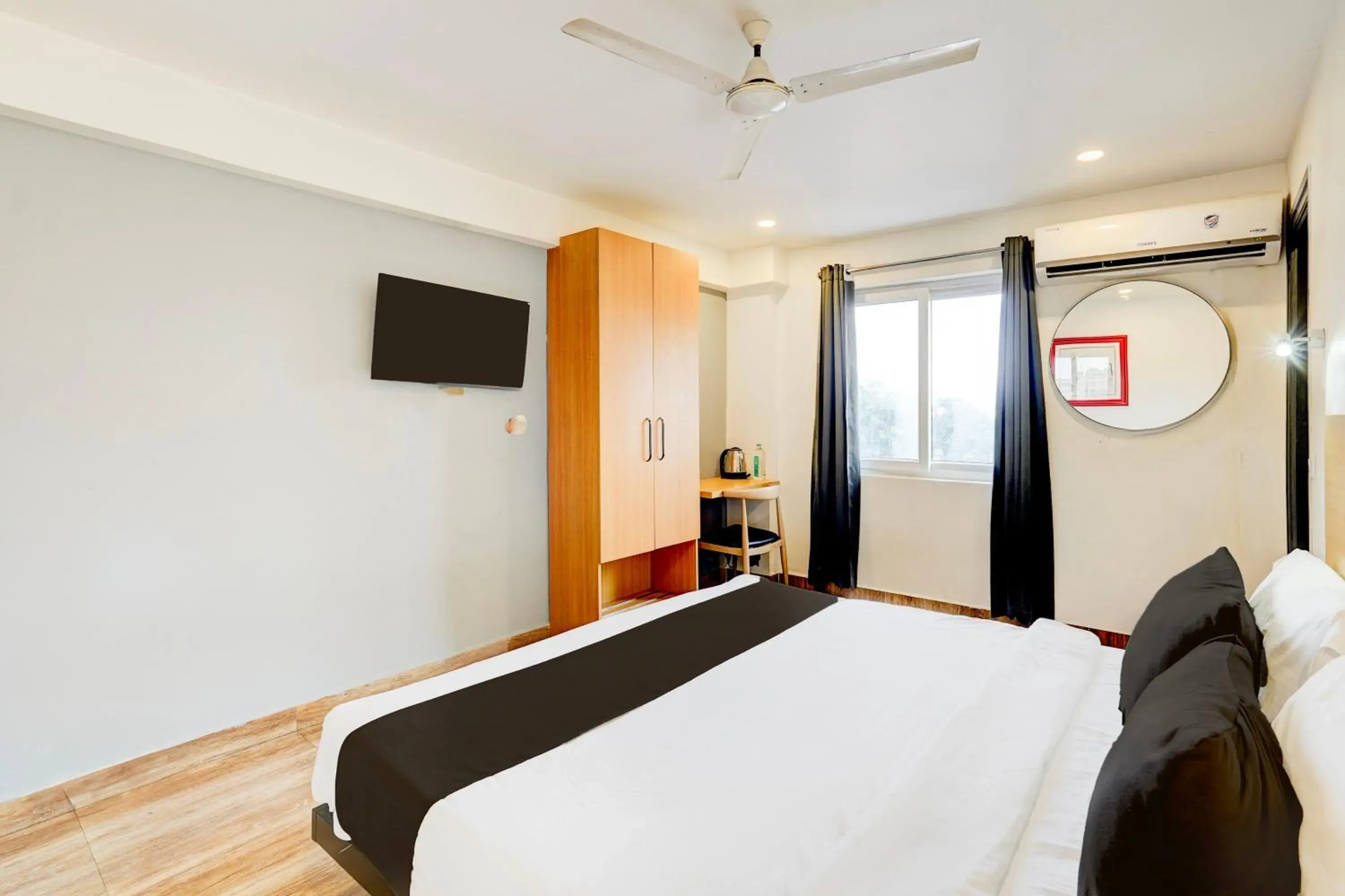 Classic Triple Room - single occupancy in Super Townhouse Tirupati Classic Triple Room - single occupancy in Super Townhouse Tirupati