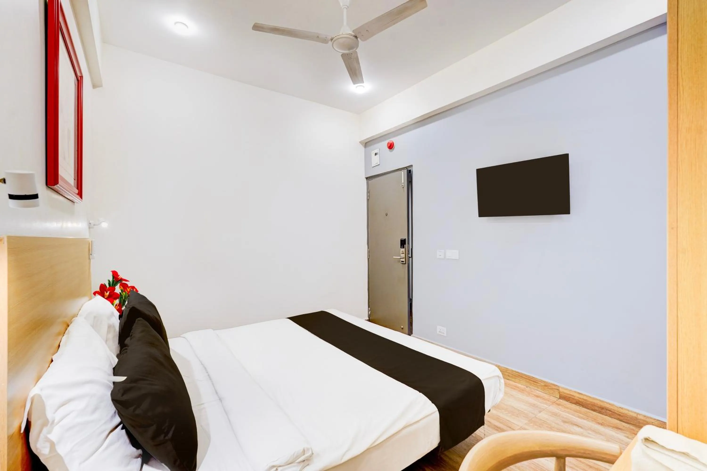 Bedroom, Bed in Super Townhouse Tirupati