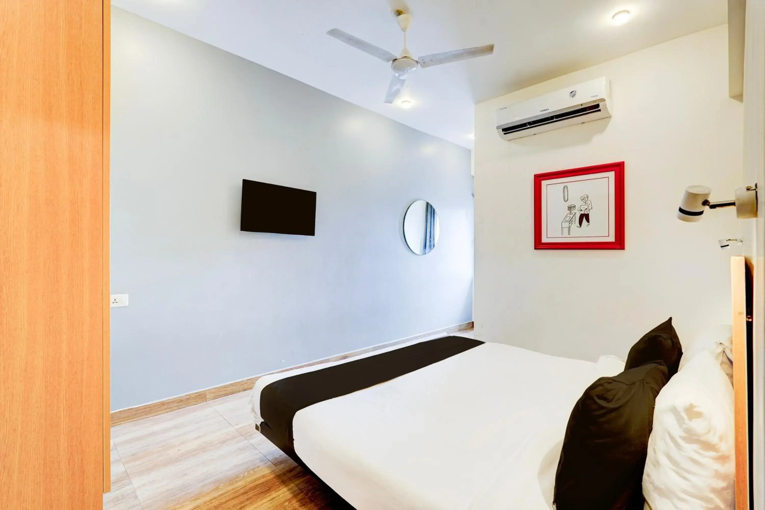 Bedroom, Bed in Super Townhouse Tirupati Bedroom, Bed in Super Townhouse Tirupati