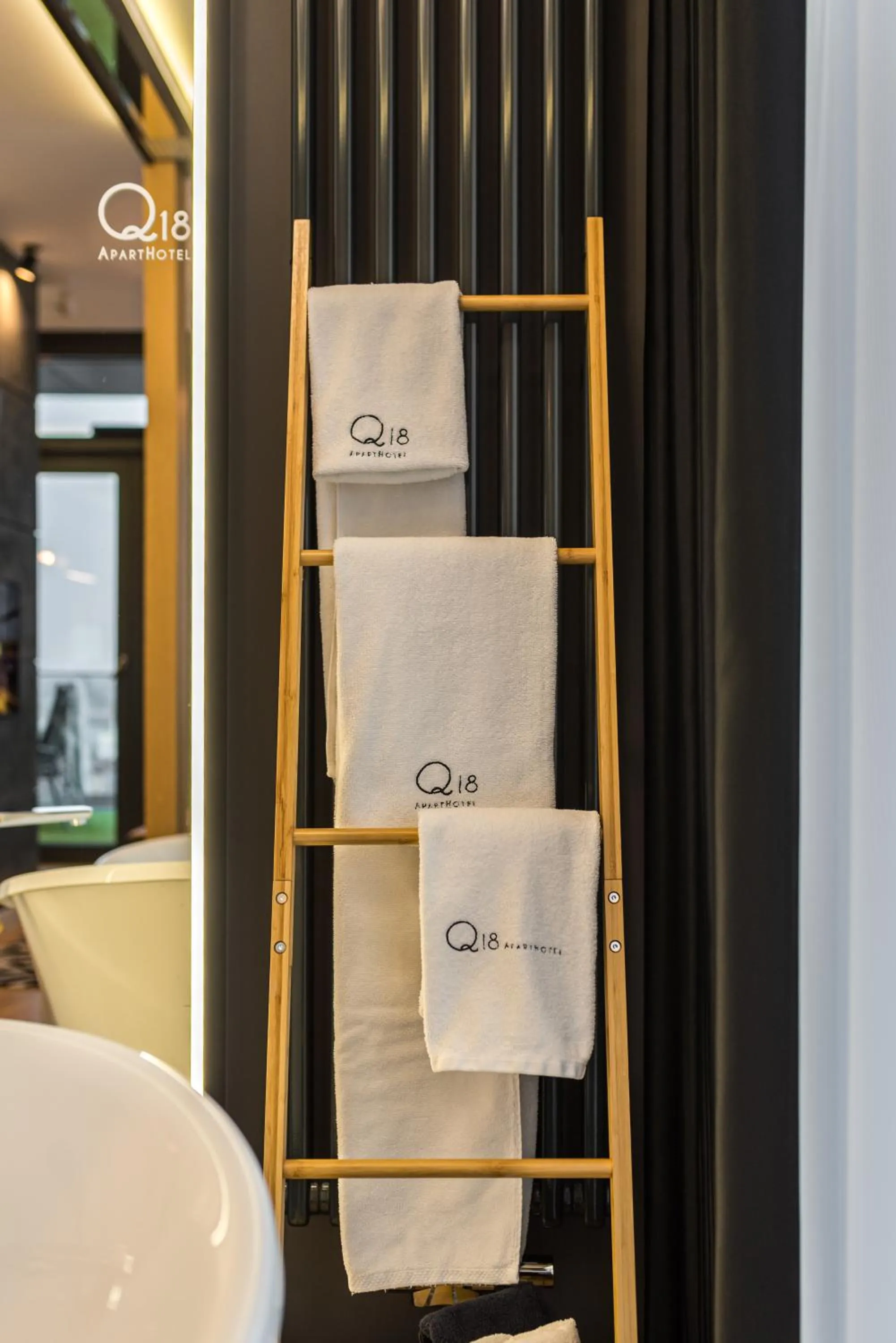 Bathroom in Q18 ApartHotel