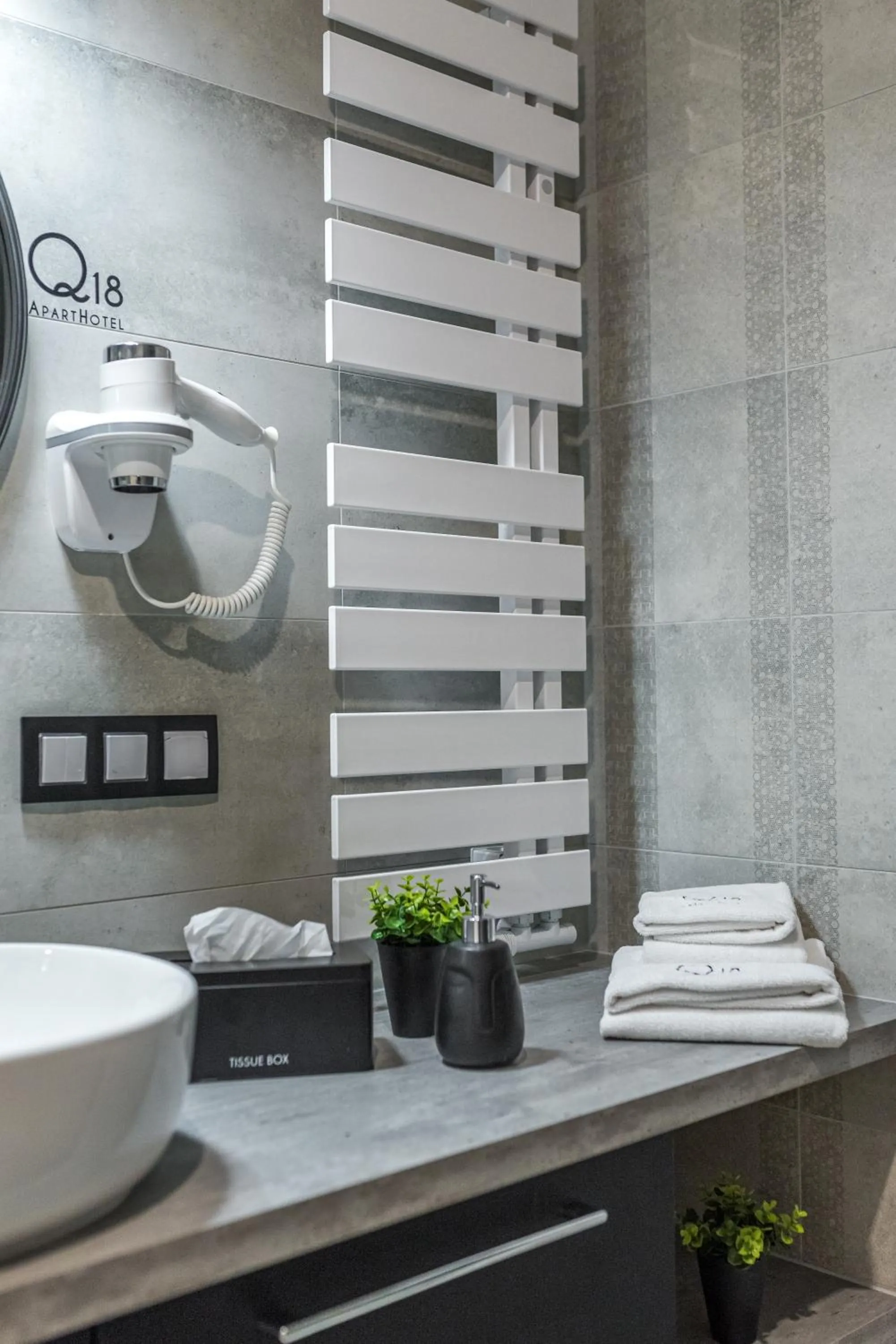 Bathroom in Q18 ApartHotel