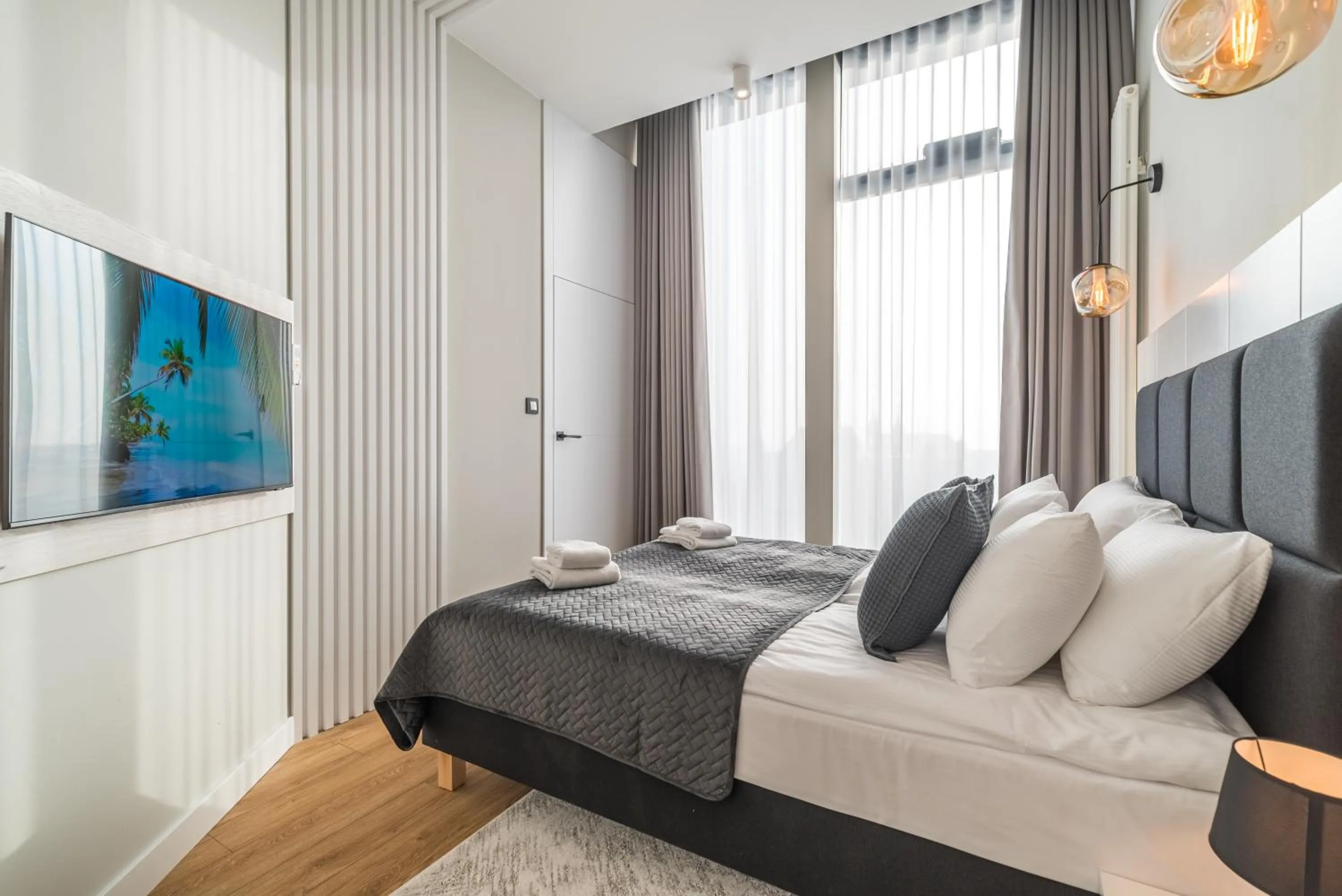 Bed in Q18 ApartHotel