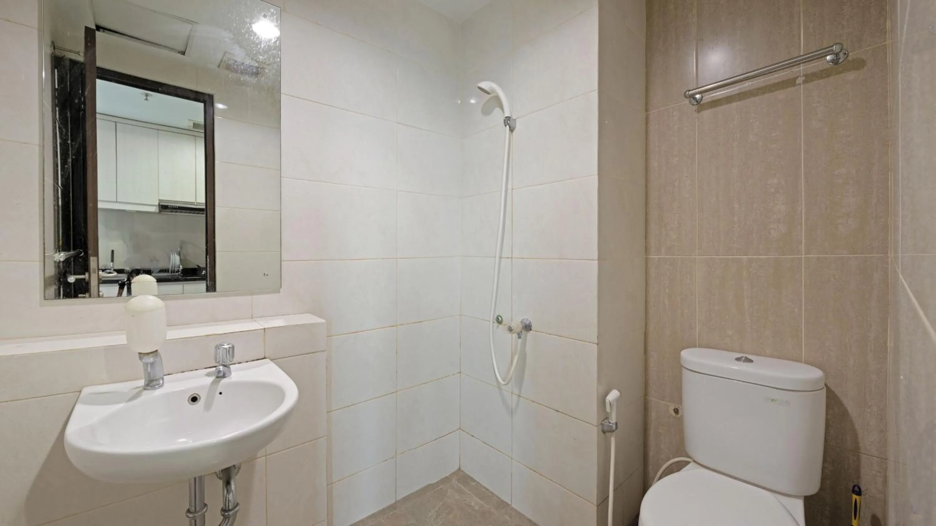 Bathroom in Apartemen Grand Dhika City by Nina