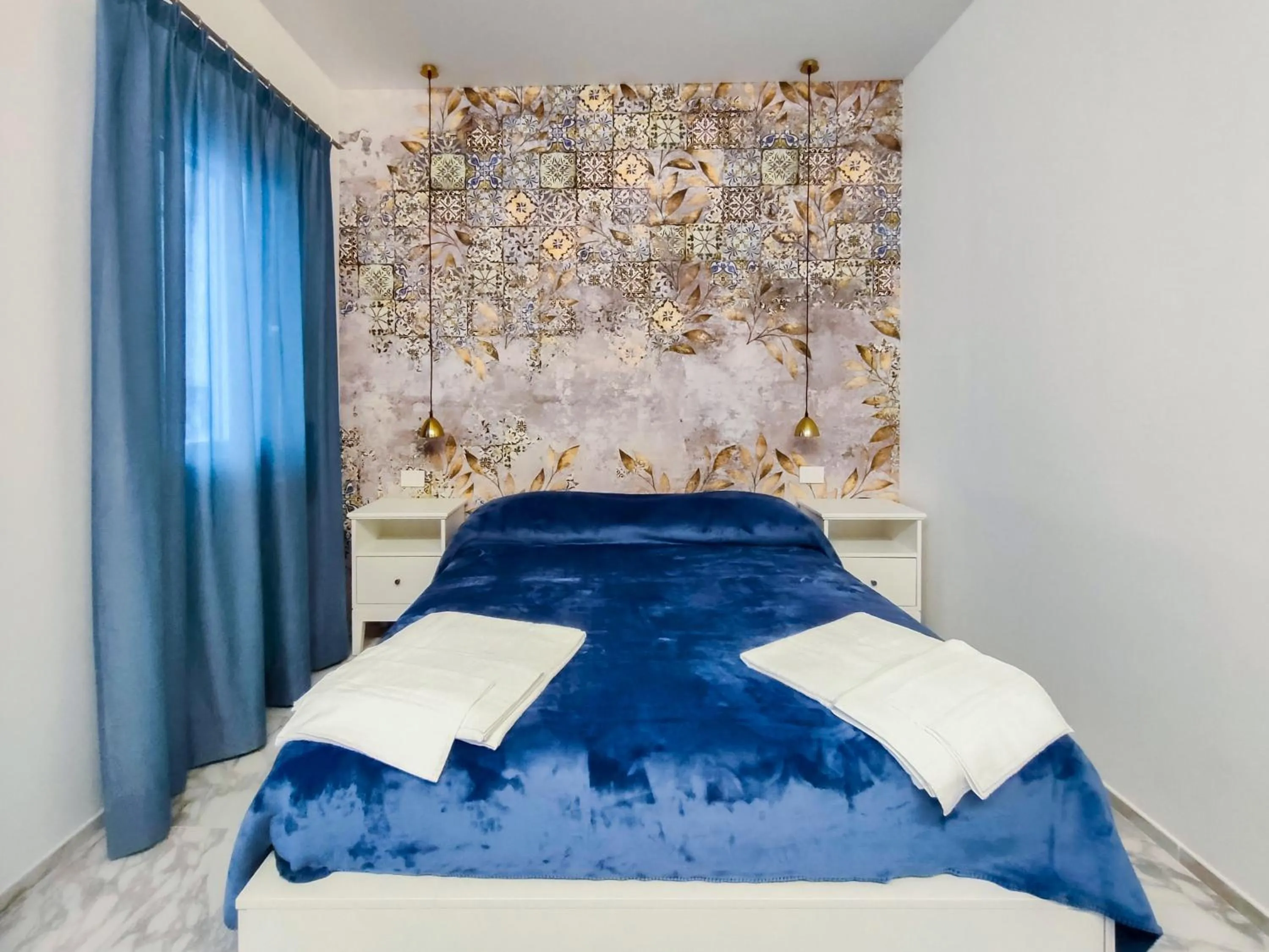 Bed in Cubacalatafimi Rooms