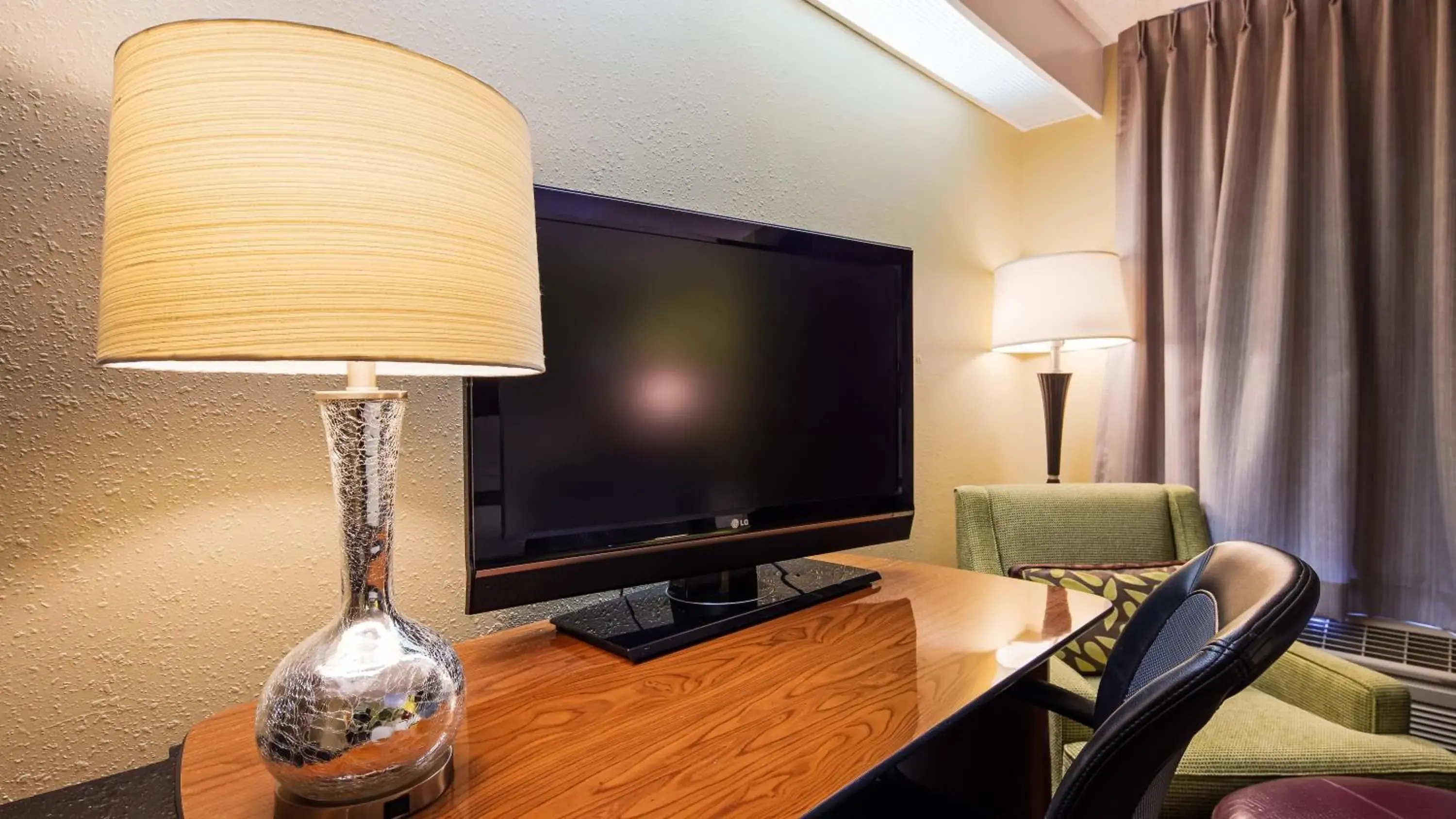 TV and multimedia, TV/Entertainment Center in SureStay Plus by Best Western Thornton Denver North