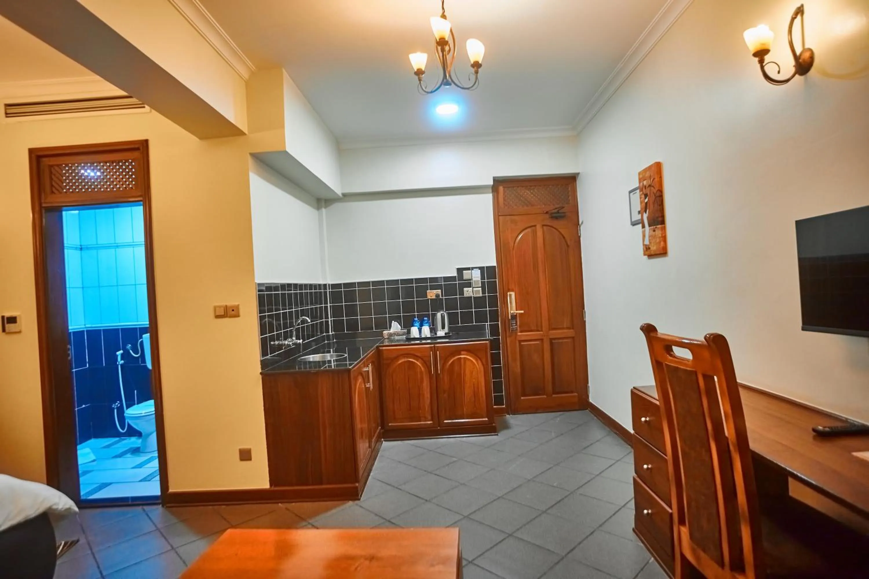 Kitchen or kitchenette in seven skies hotel