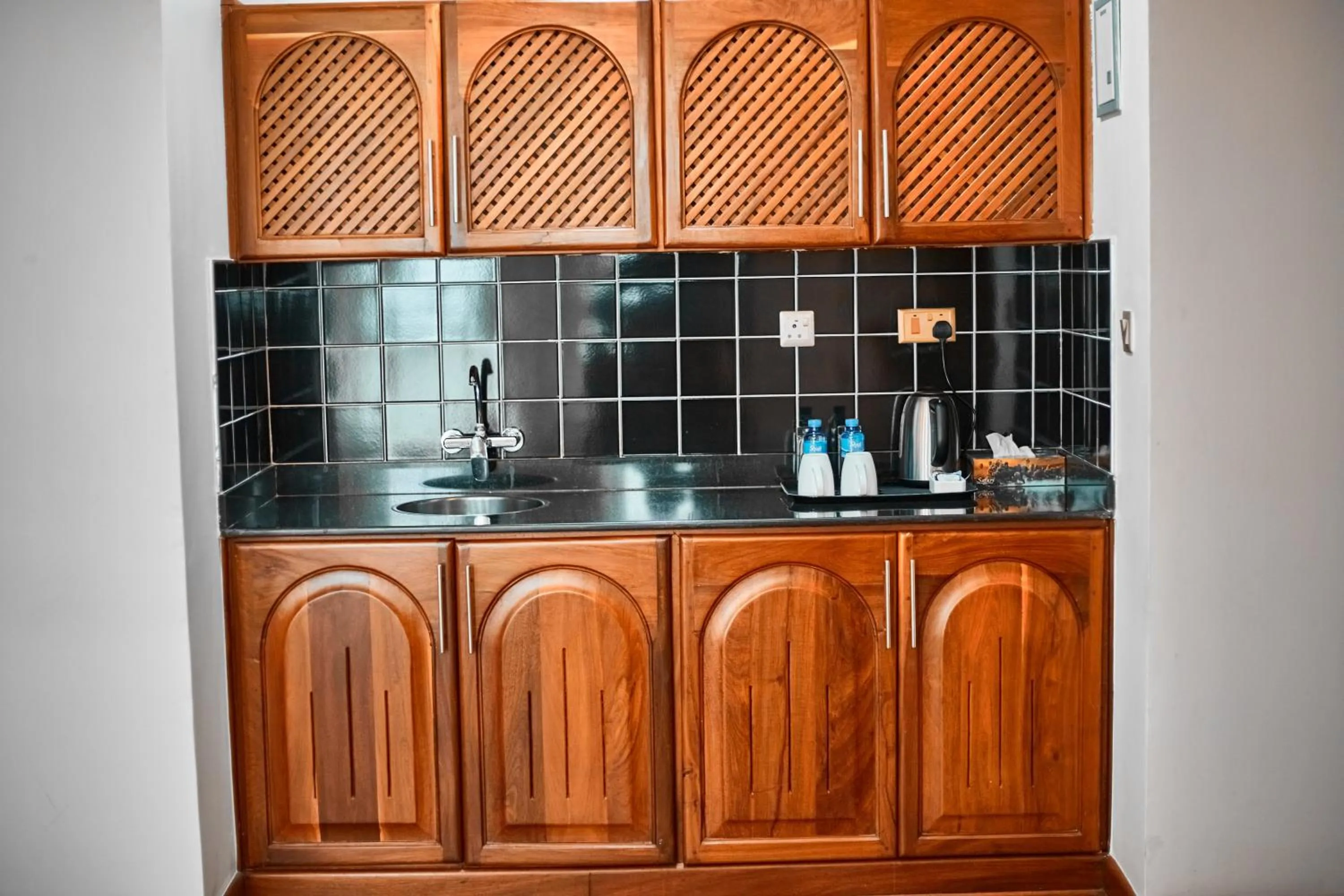 Kitchen or kitchenette in seven skies hotel