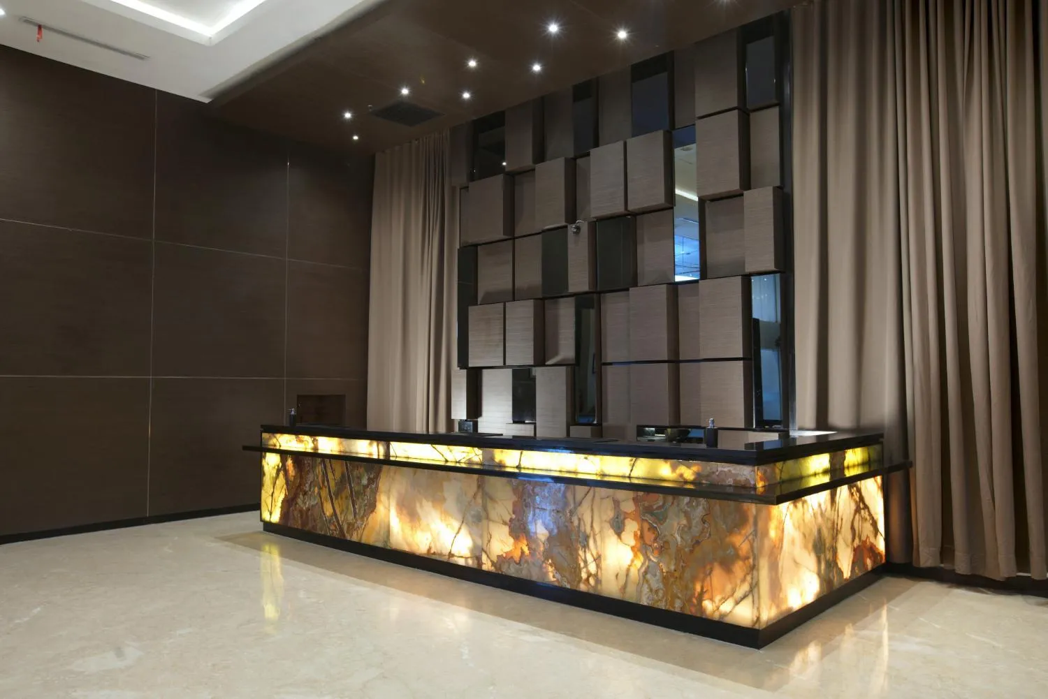 Lobby or reception in Aston Jambi Hotel & Conference Center