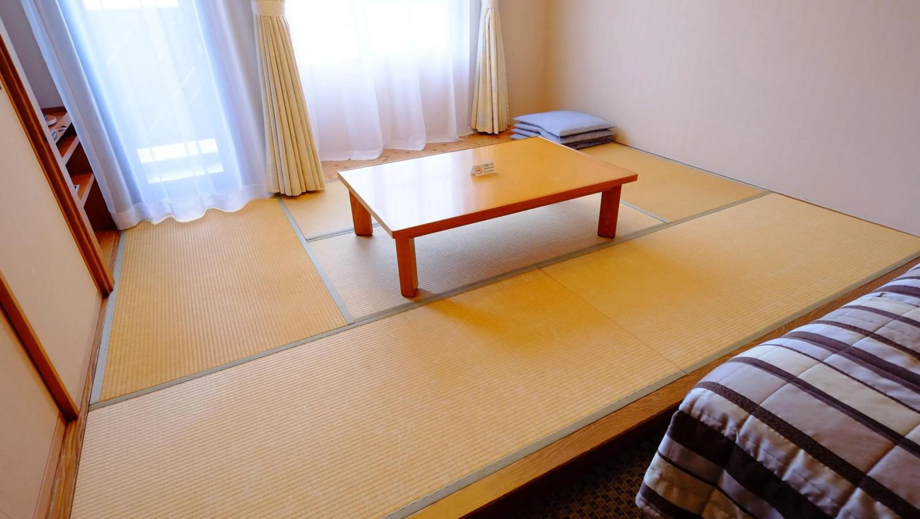 Seating area, Bed in Hotel Harvest Skijam Katsuyama