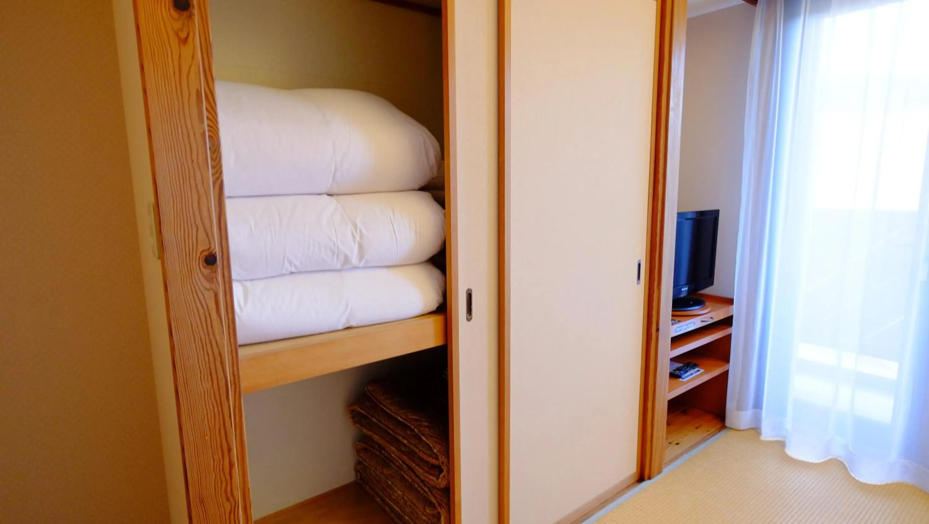 Decorative detail, Bed in Hotel Harvest Skijam Katsuyama