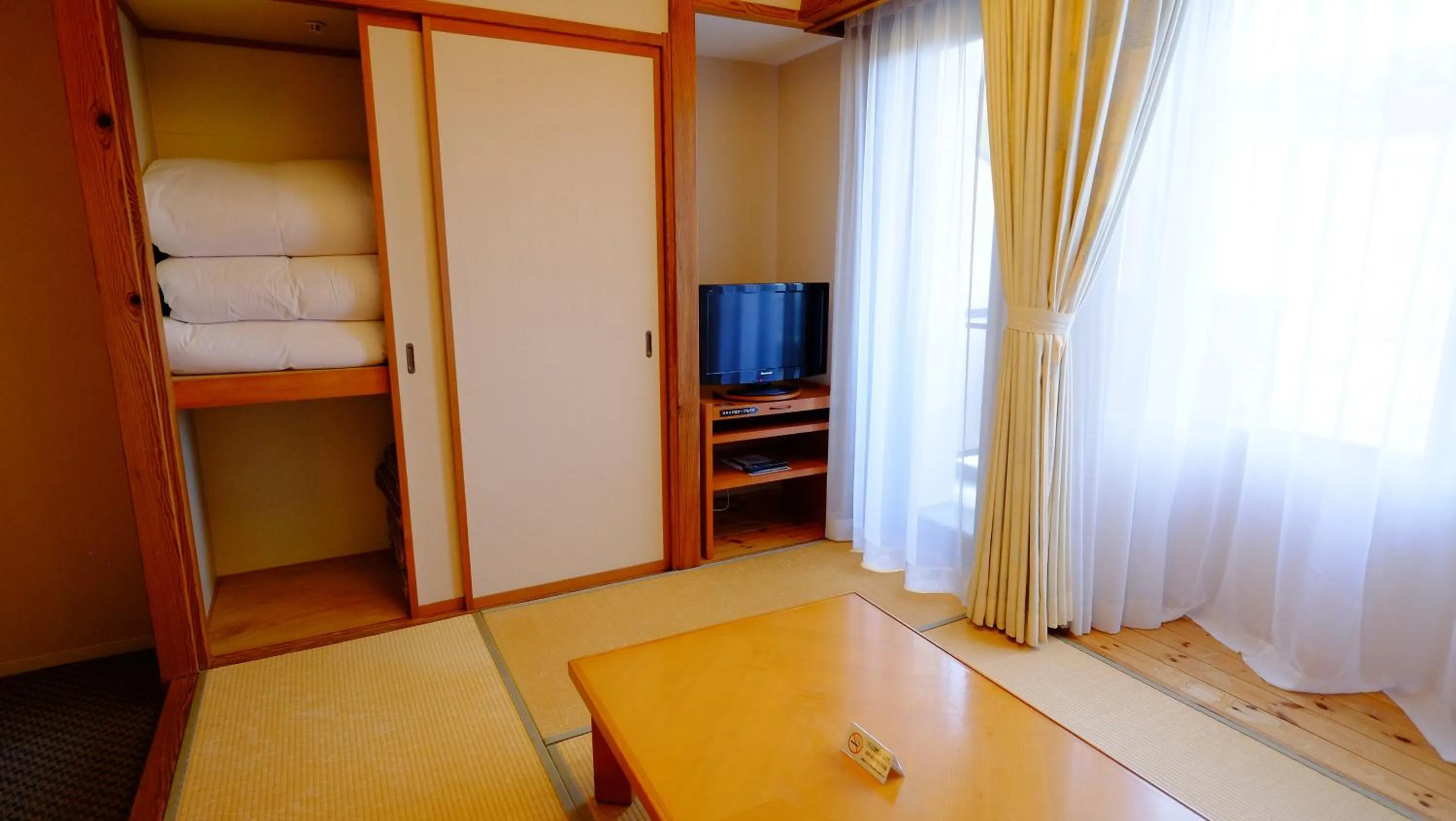 Decorative detail, Bed in Hotel Harvest Skijam Katsuyama