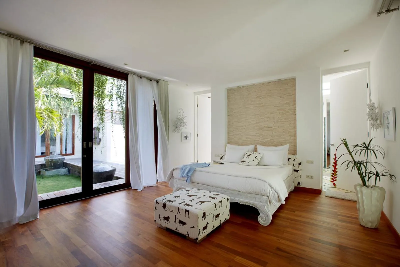 Bed in Pure Villa Bali by Nagisa Bali