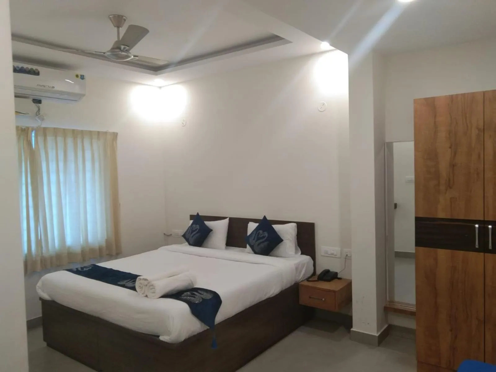 Bed in Hotel Amulya Fine Dine