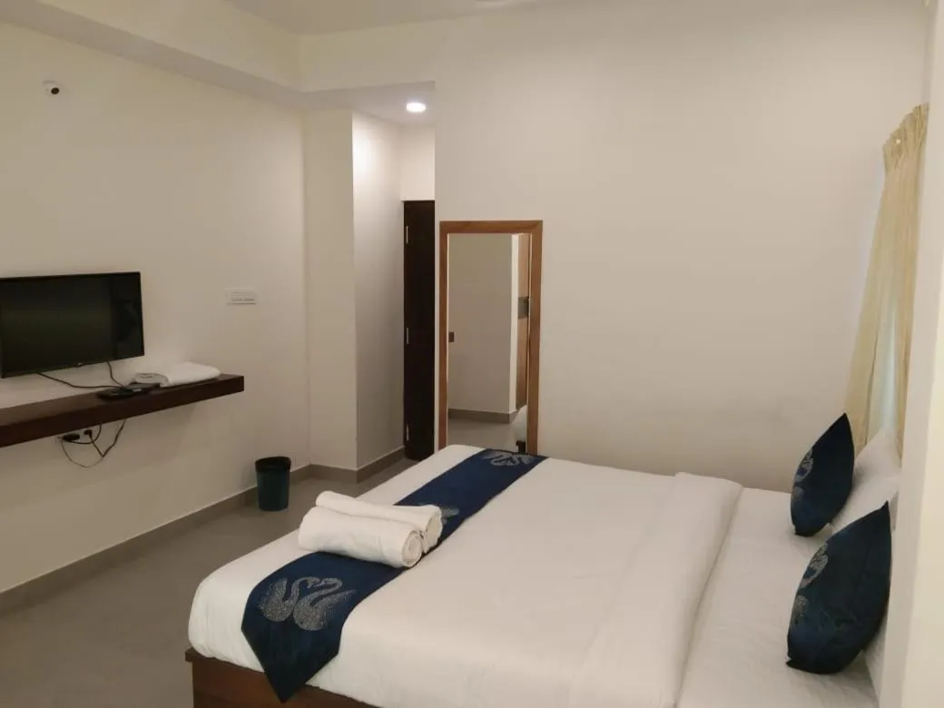 Bed in Hotel Amulya Fine Dine