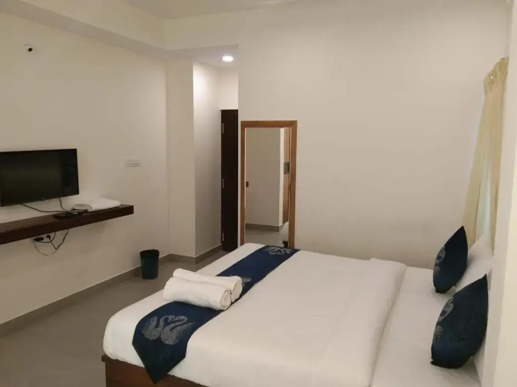 Bed in Hotel Amulya Fine Dine Bed in Hotel Amulya Fine Dine