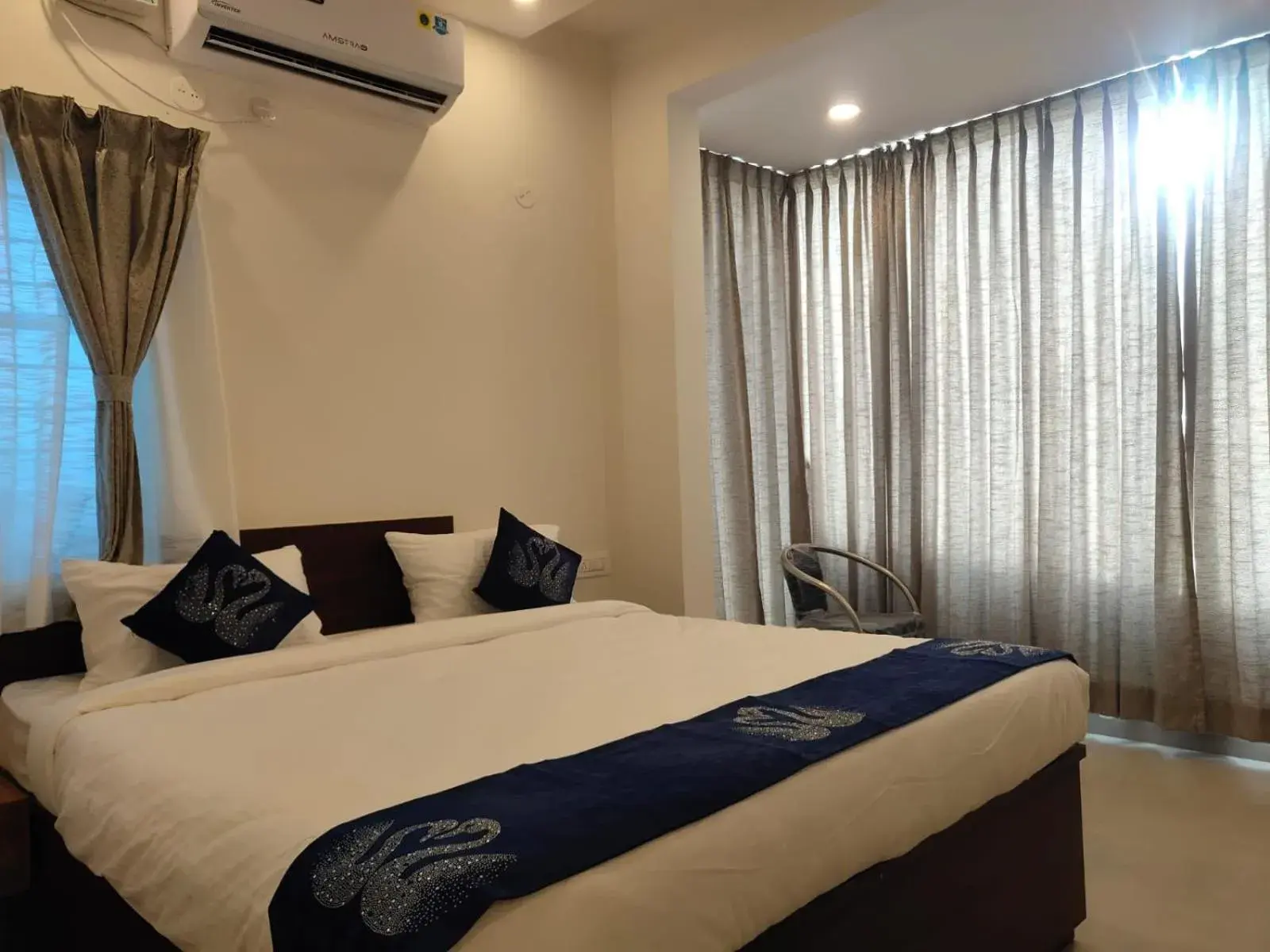 Bed in Hotel Amulya Fine Dine Bed in Hotel Amulya Fine Dine