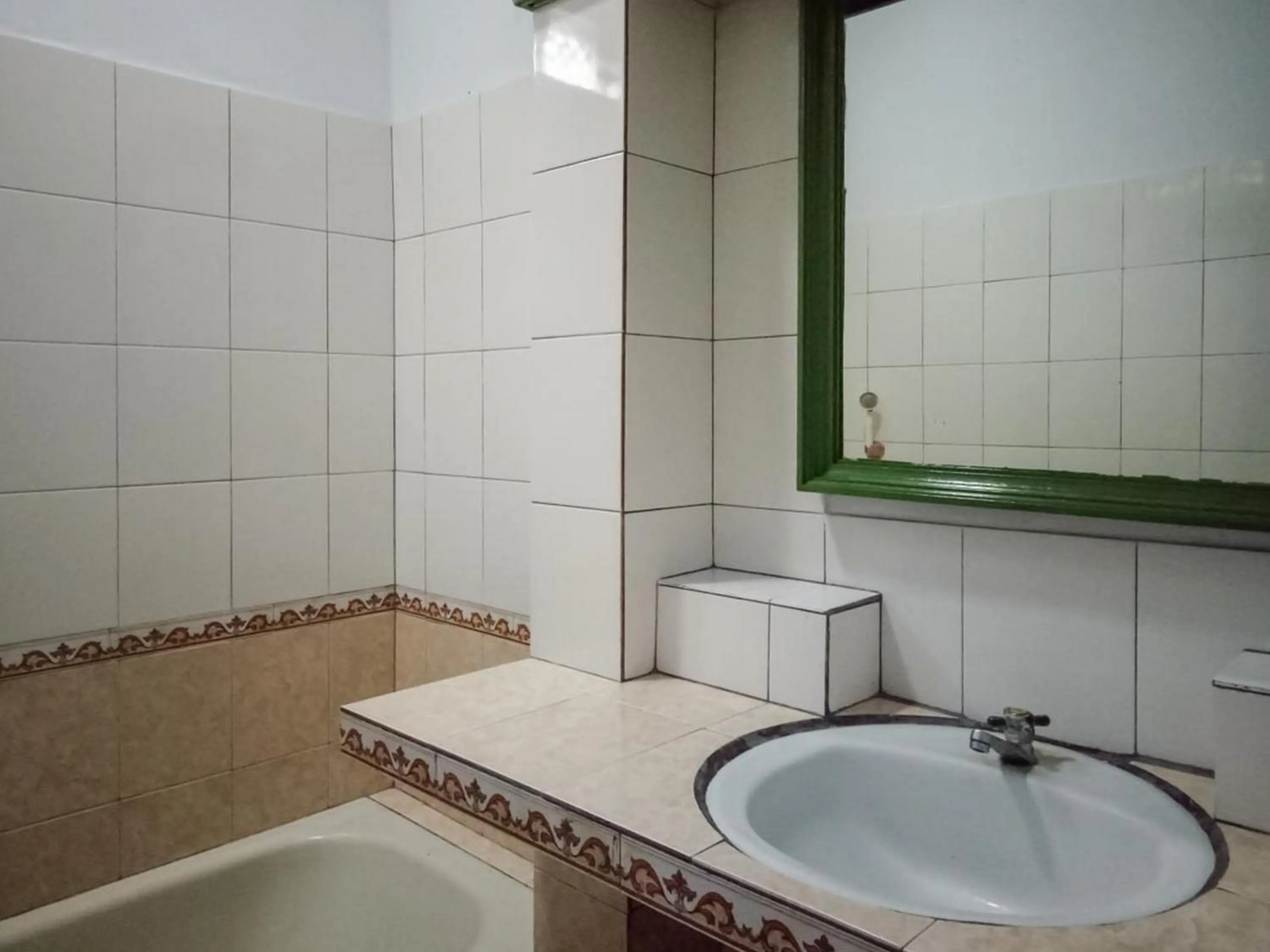 Bathroom in DATON HOUSE near Bali Zoo Ubud Mitra RedDoorz