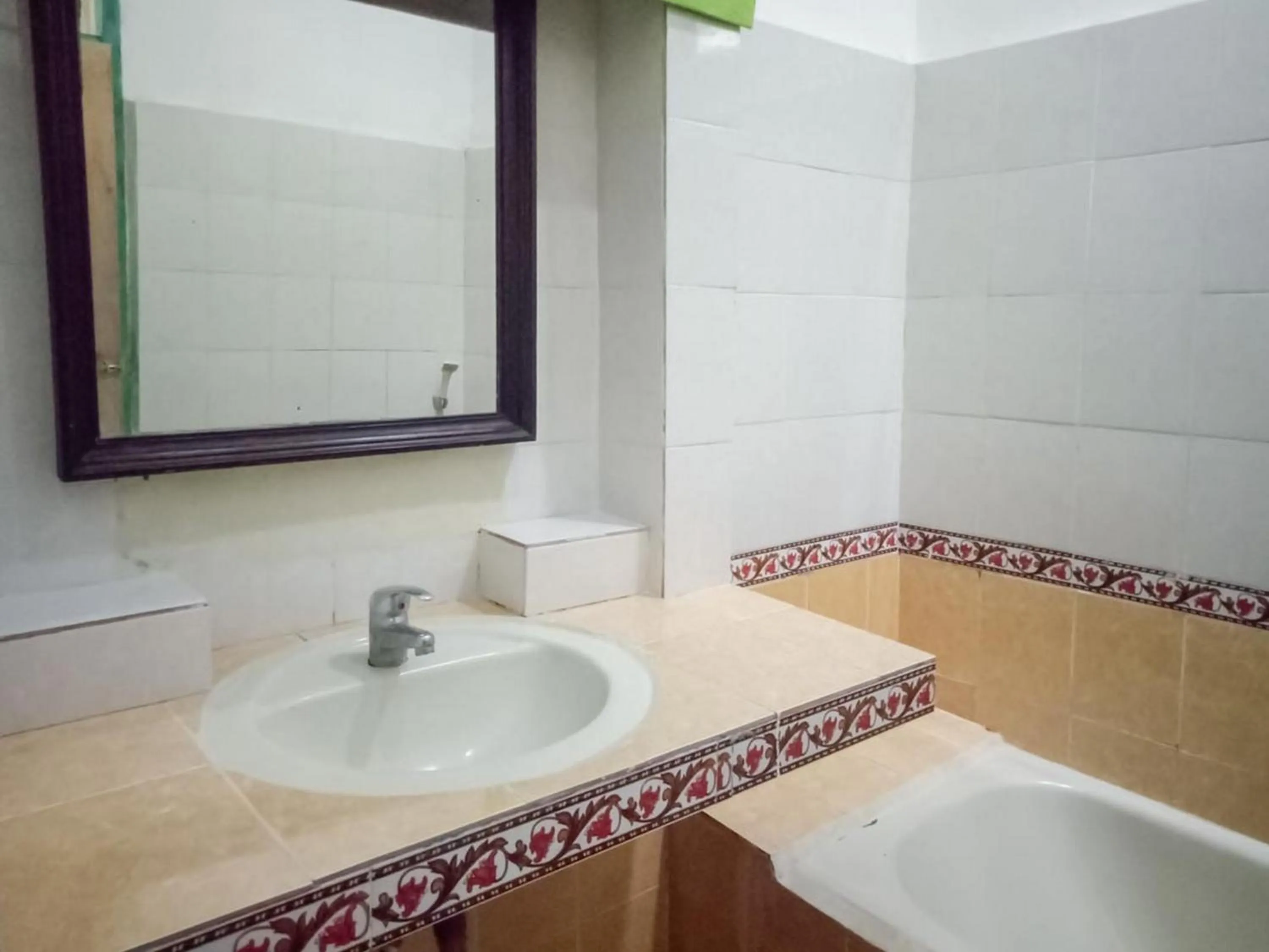Bathroom in DATON HOUSE near Bali Zoo Ubud Mitra RedDoorz