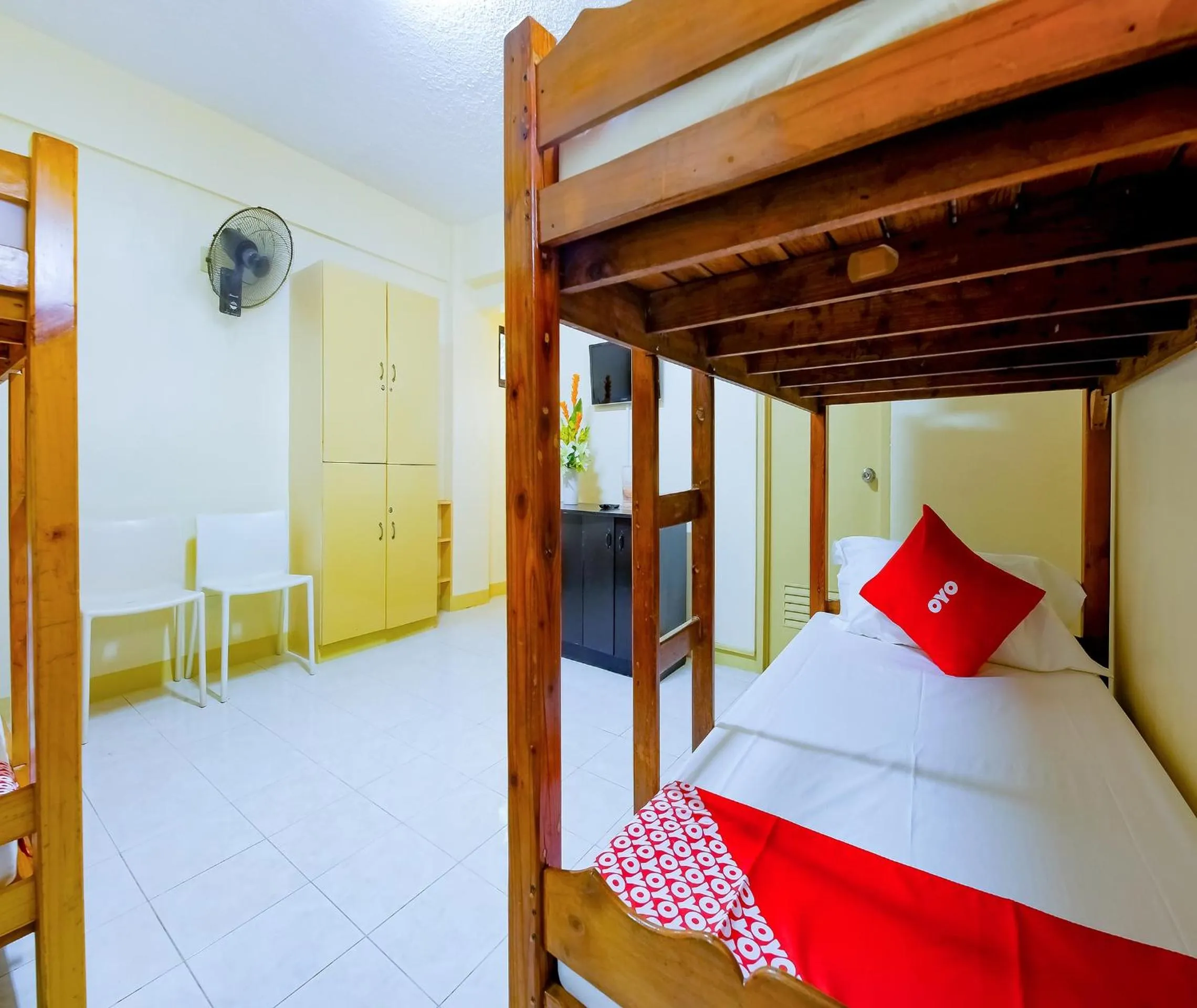 Bedroom in OYO 840 Orangenest Apartelle