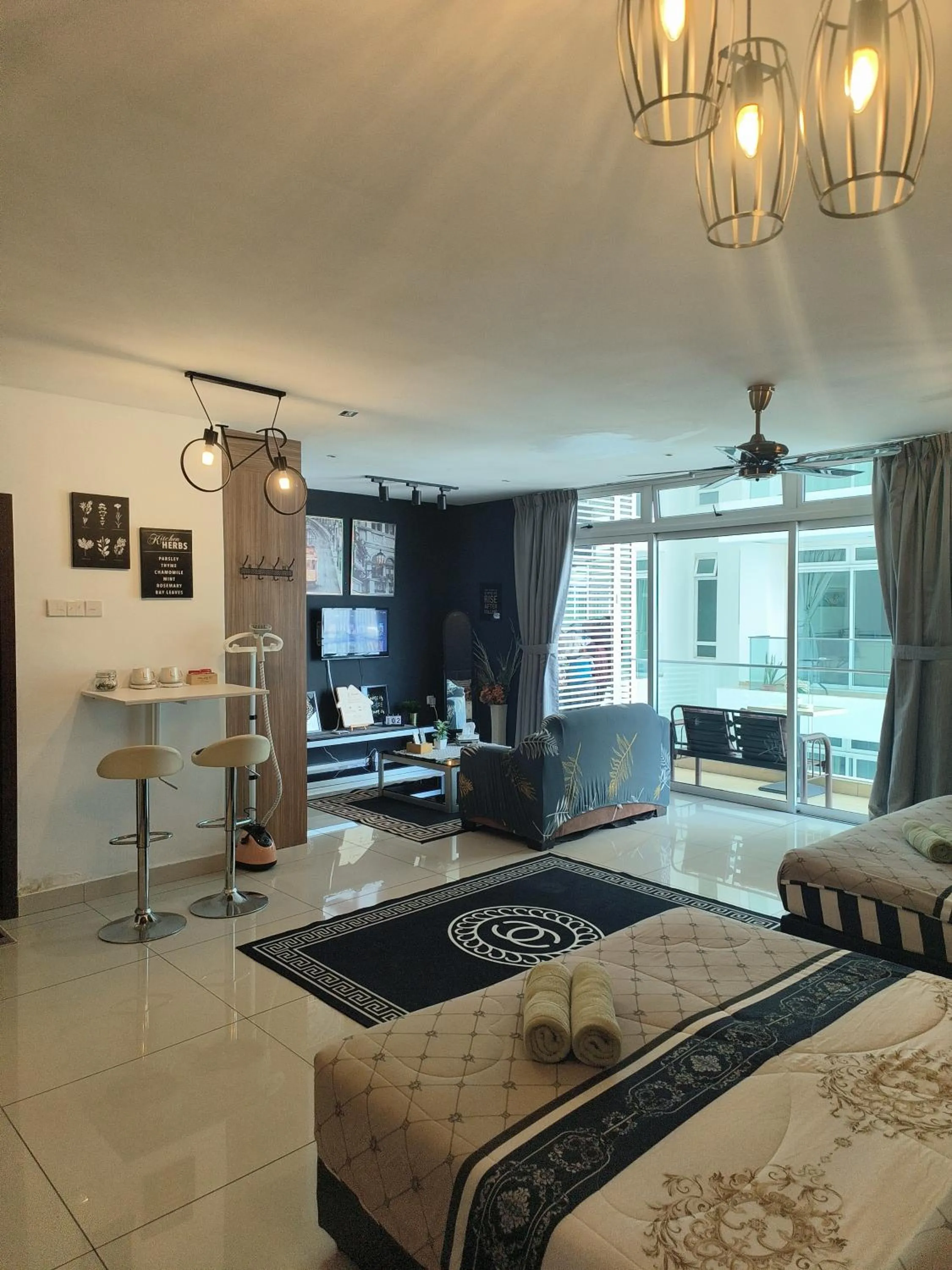 Living room, Bed in Ksl D'Esplanade Studio Apartment's 2