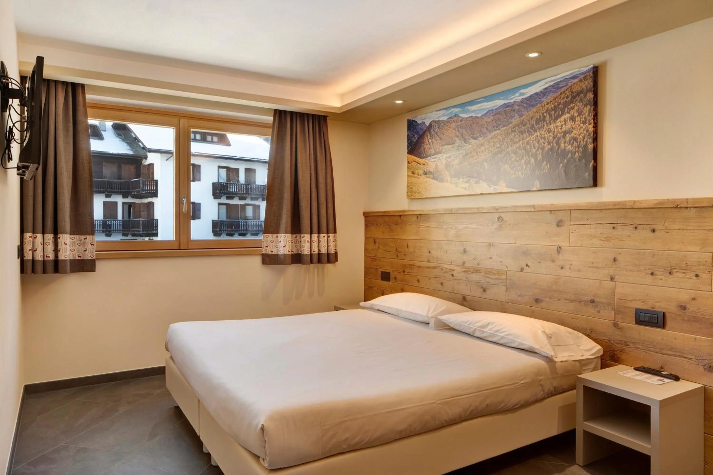 Living room, Bed in Rasia Residence Relax Stone