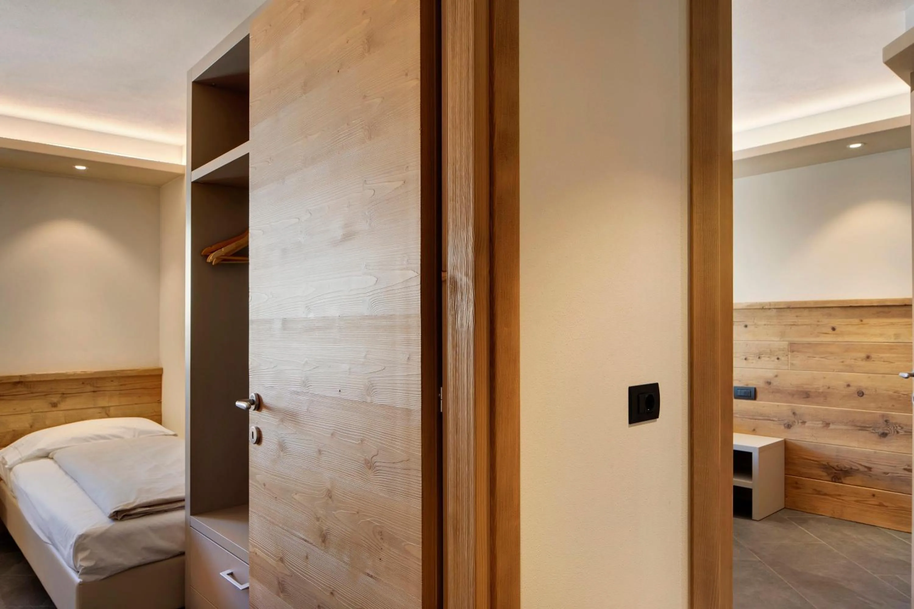 Living room, Bed in Rasia Residence Relax Stone