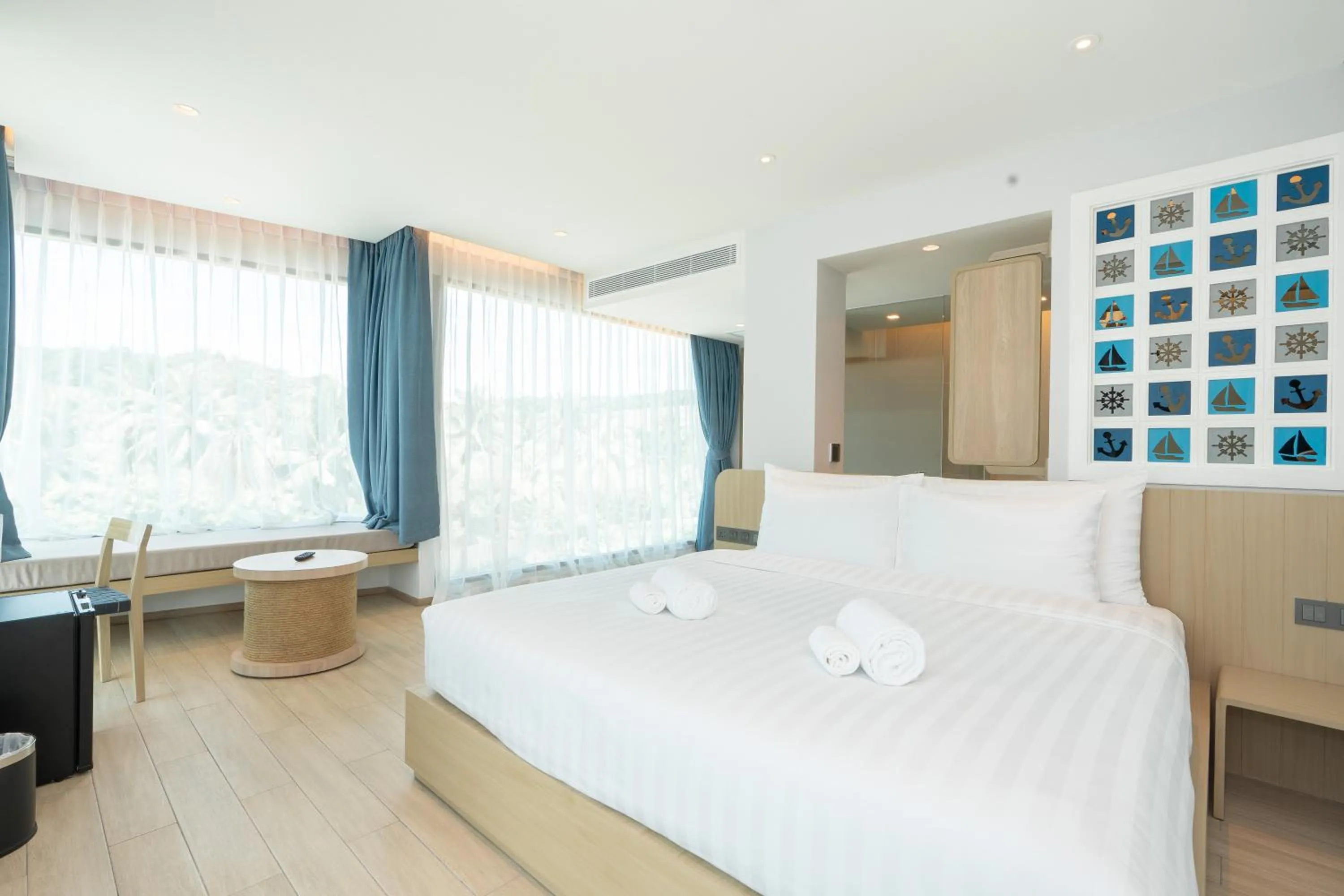 Bed in Panwaburi Beachfront Resort - SHA Extra Plus