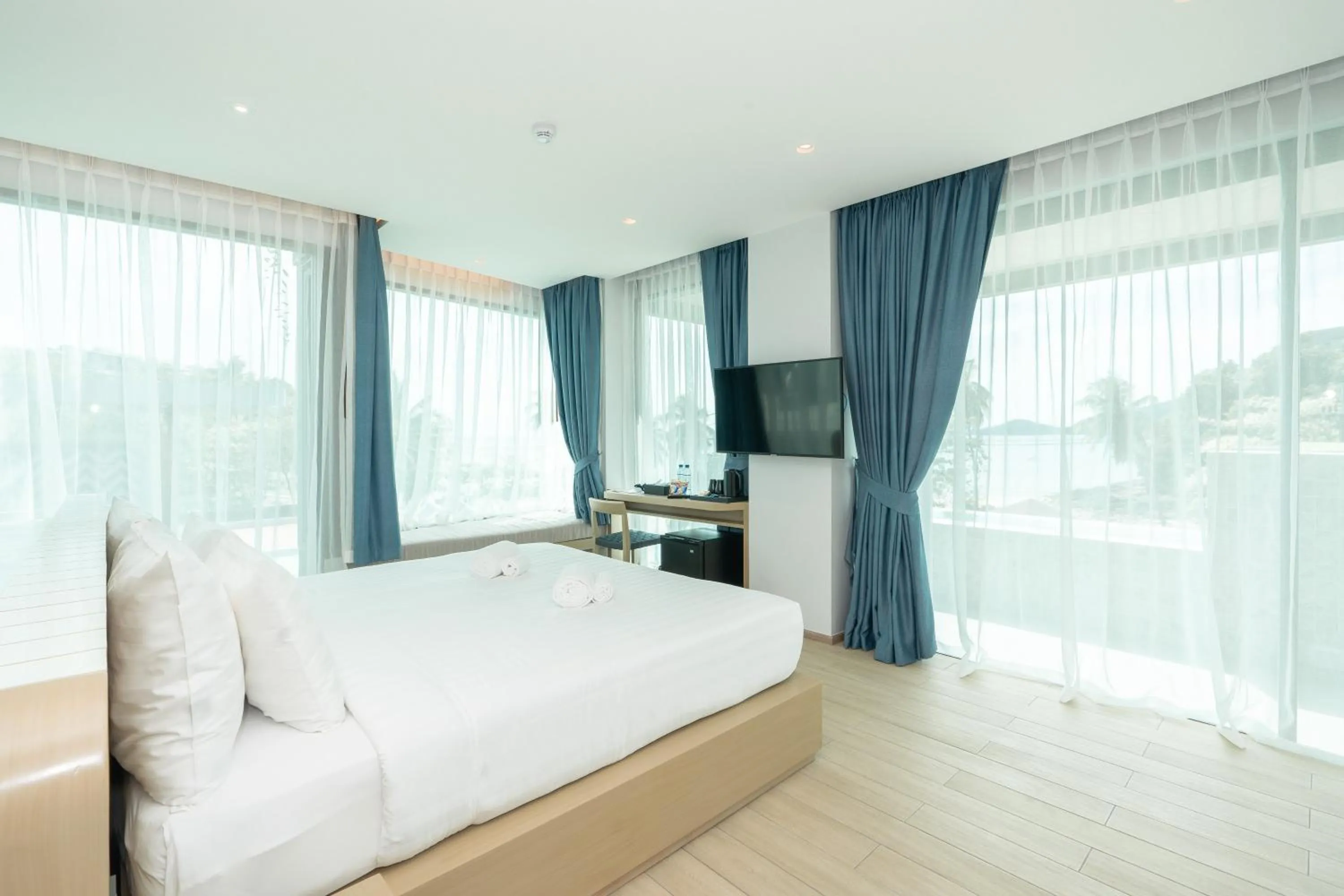 Bed in Panwaburi Beachfront Resort - SHA Extra Plus