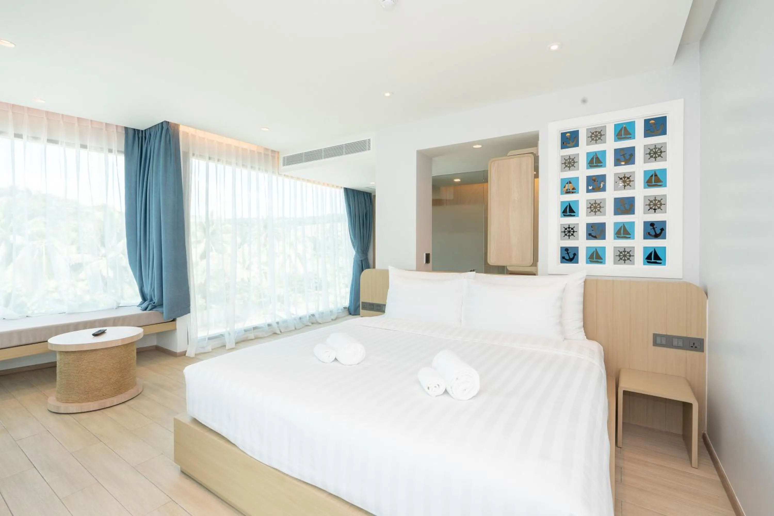 Bed in Panwaburi Beachfront Resort - SHA Extra Plus