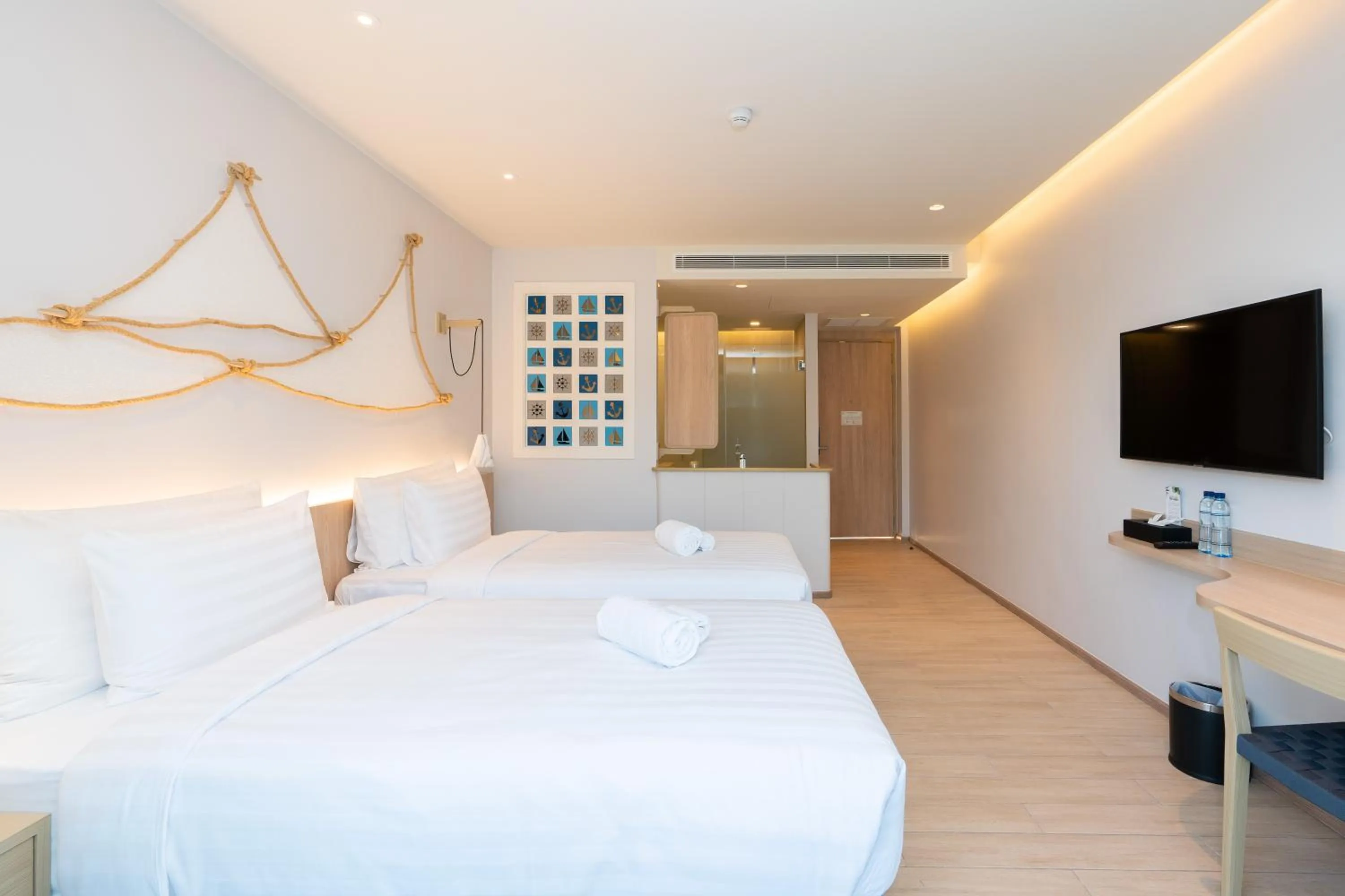 Bed in Panwaburi Beachfront Resort - SHA Extra Plus