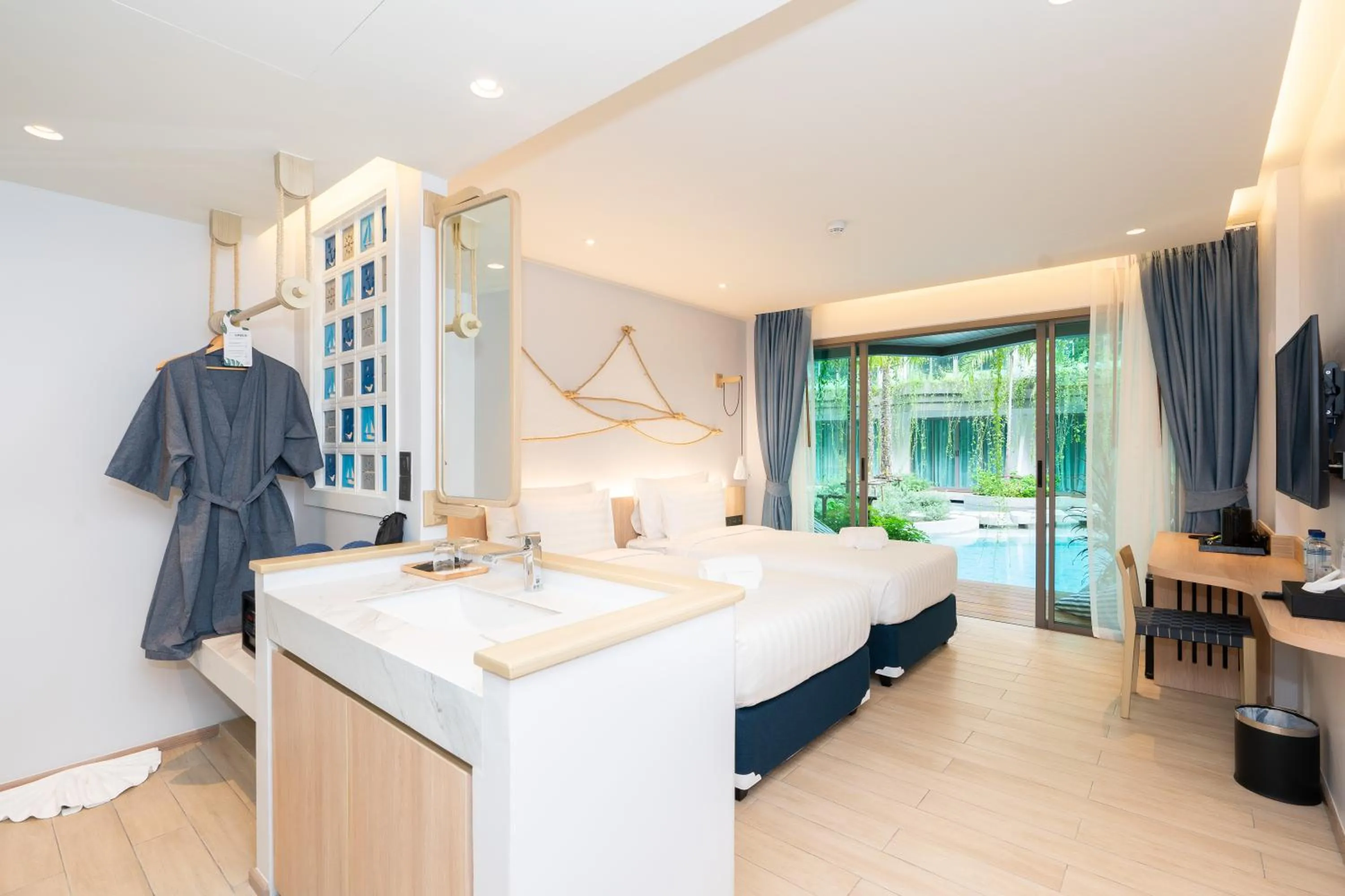 Bed in Panwaburi Beachfront Resort - SHA Extra Plus