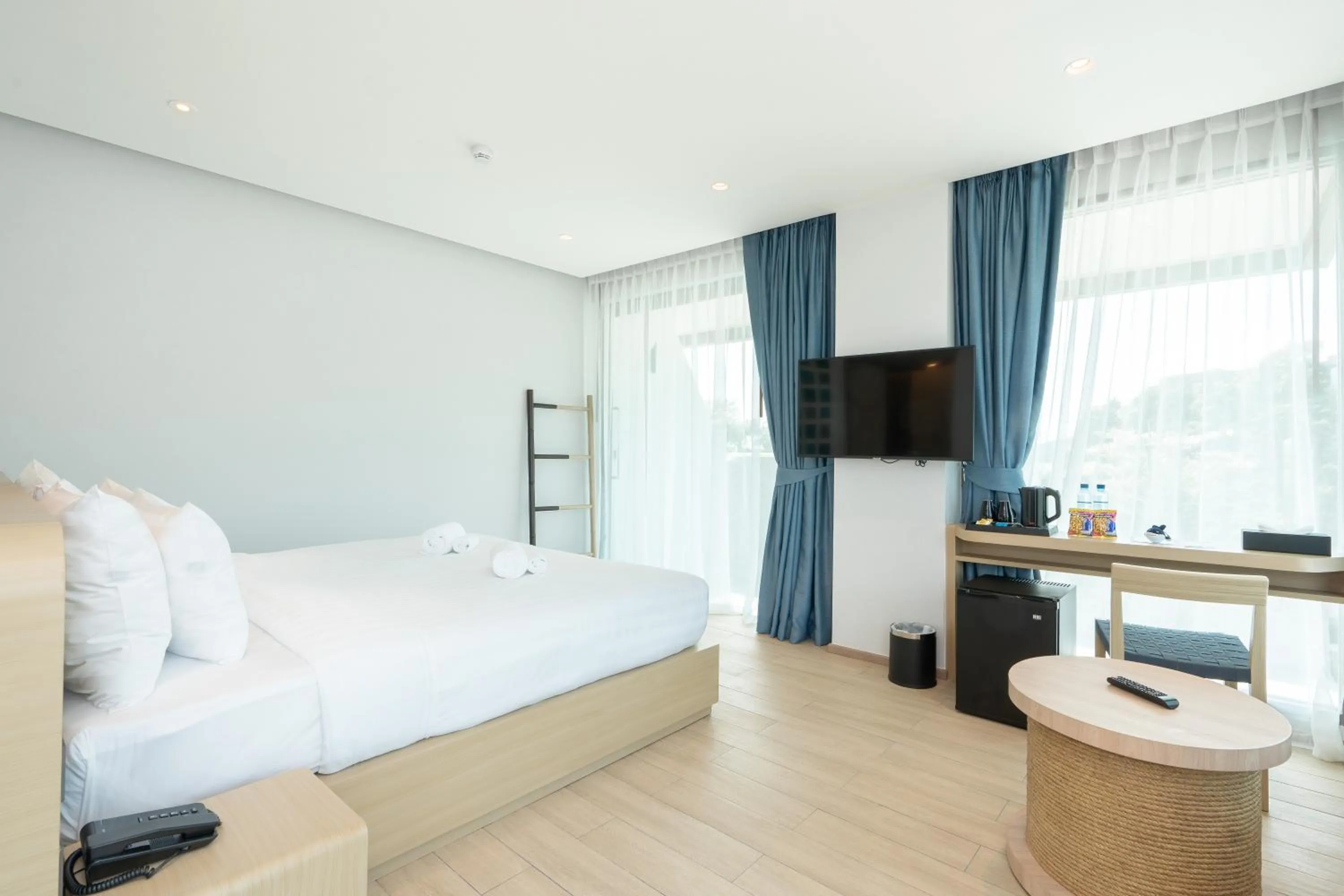 Bed in Panwaburi Beachfront Resort - SHA Extra Plus