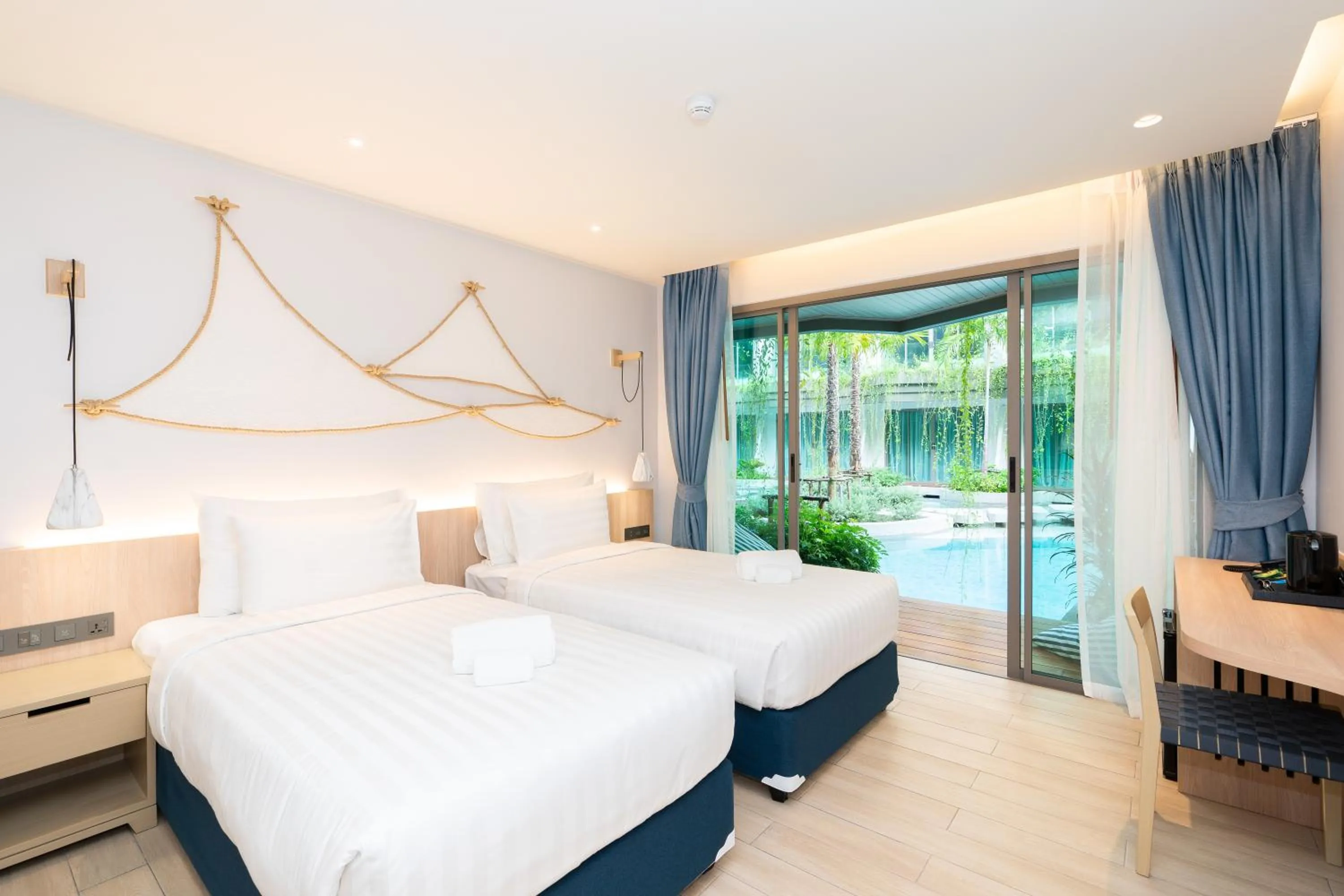 Bed in Panwaburi Beachfront Resort - SHA Extra Plus