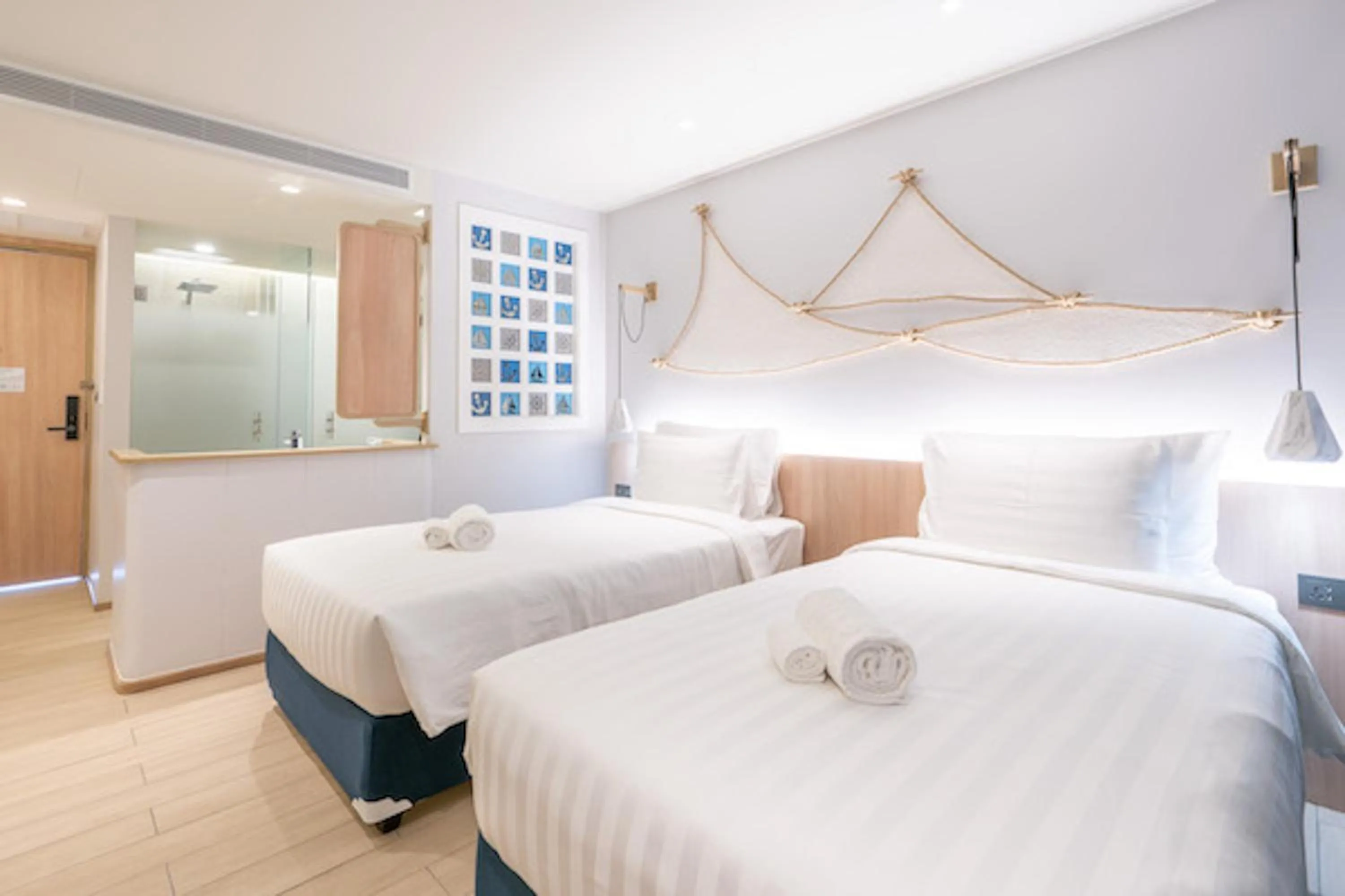 Bed in Panwaburi Beachfront Resort - SHA Extra Plus