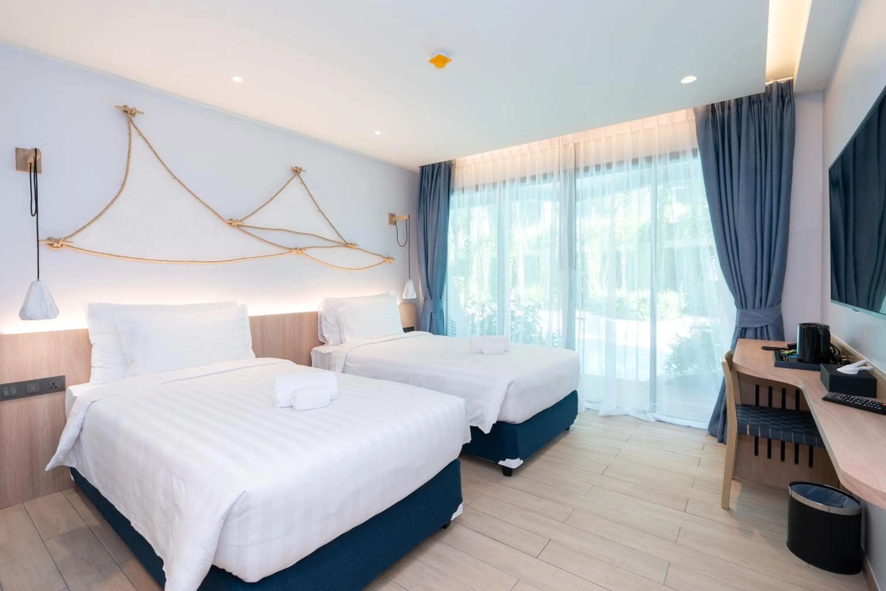 Bed in Panwaburi Beachfront Resort - SHA Extra Plus