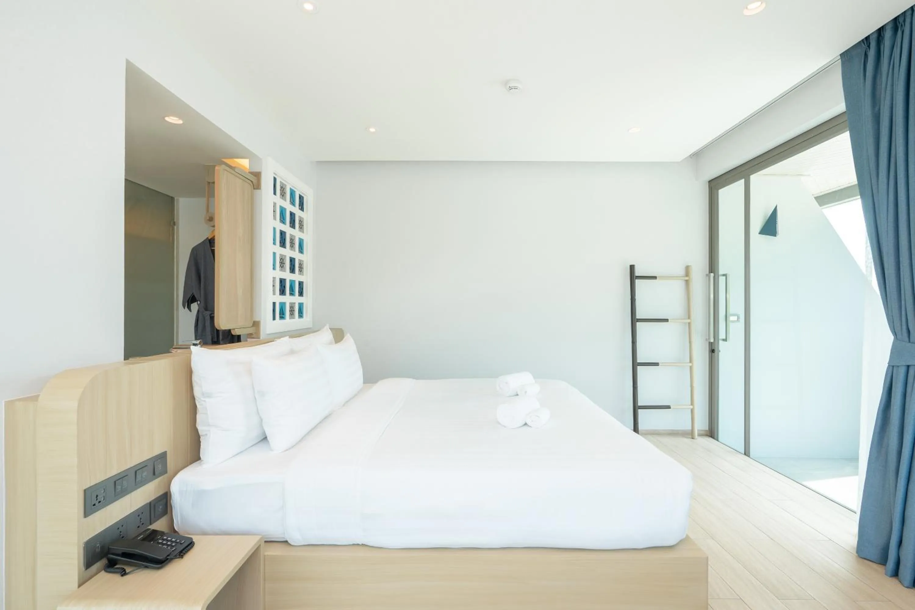 Bed in Panwaburi Beachfront Resort - SHA Extra Plus