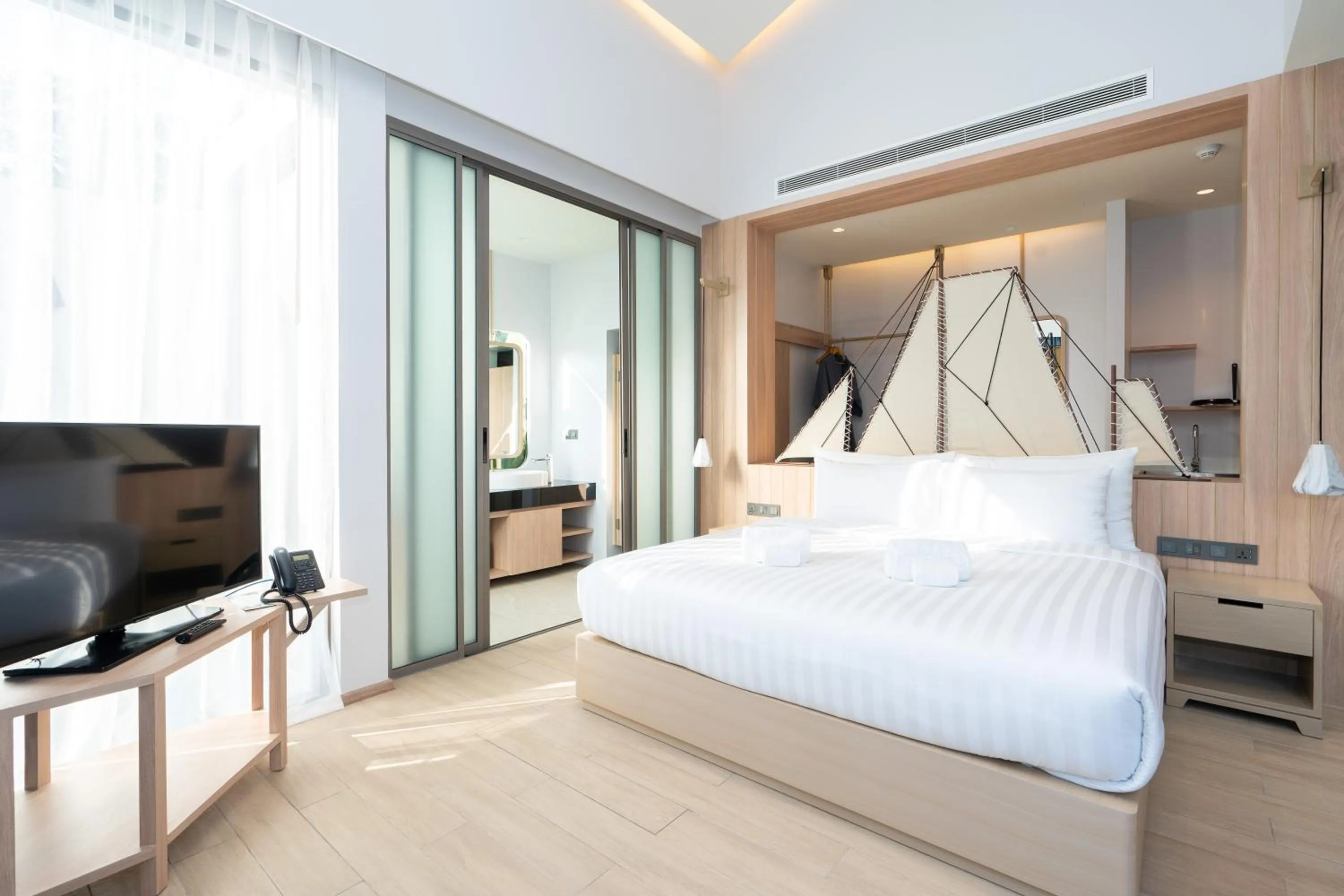 Bed in Panwaburi Beachfront Resort - SHA Extra Plus