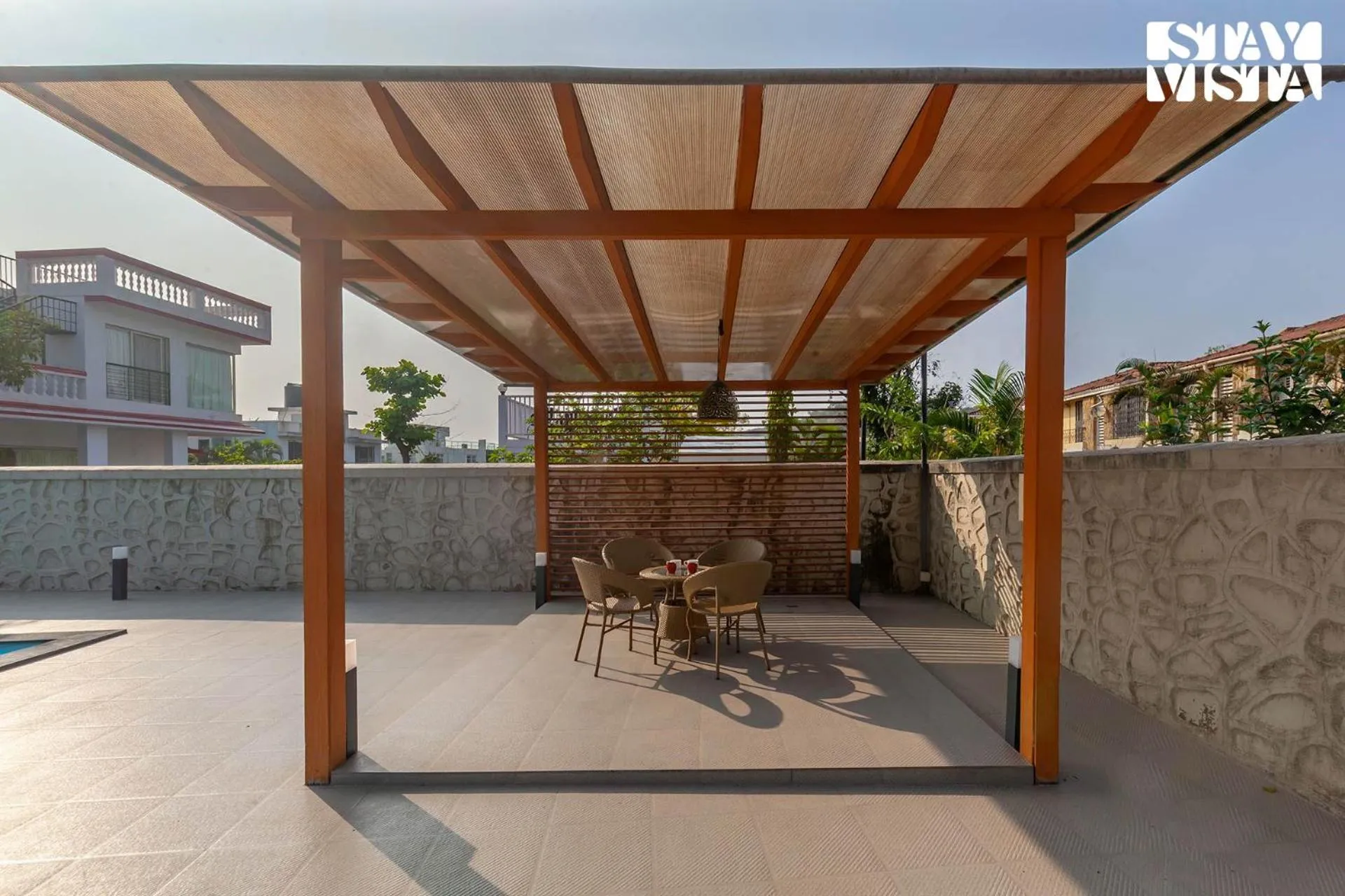 Balcony/Terrace in StayVista's Brookvale Cottage - Dive into tranquility with pool view and gazebo