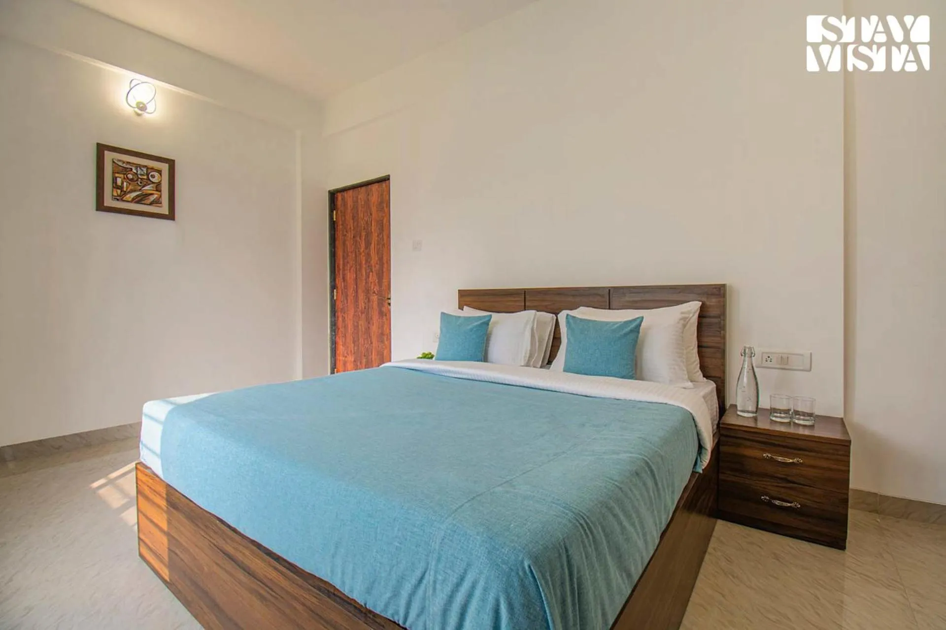 Bed in StayVista's Brookvale Cottage - Dive into tranquility with pool view and gazebo