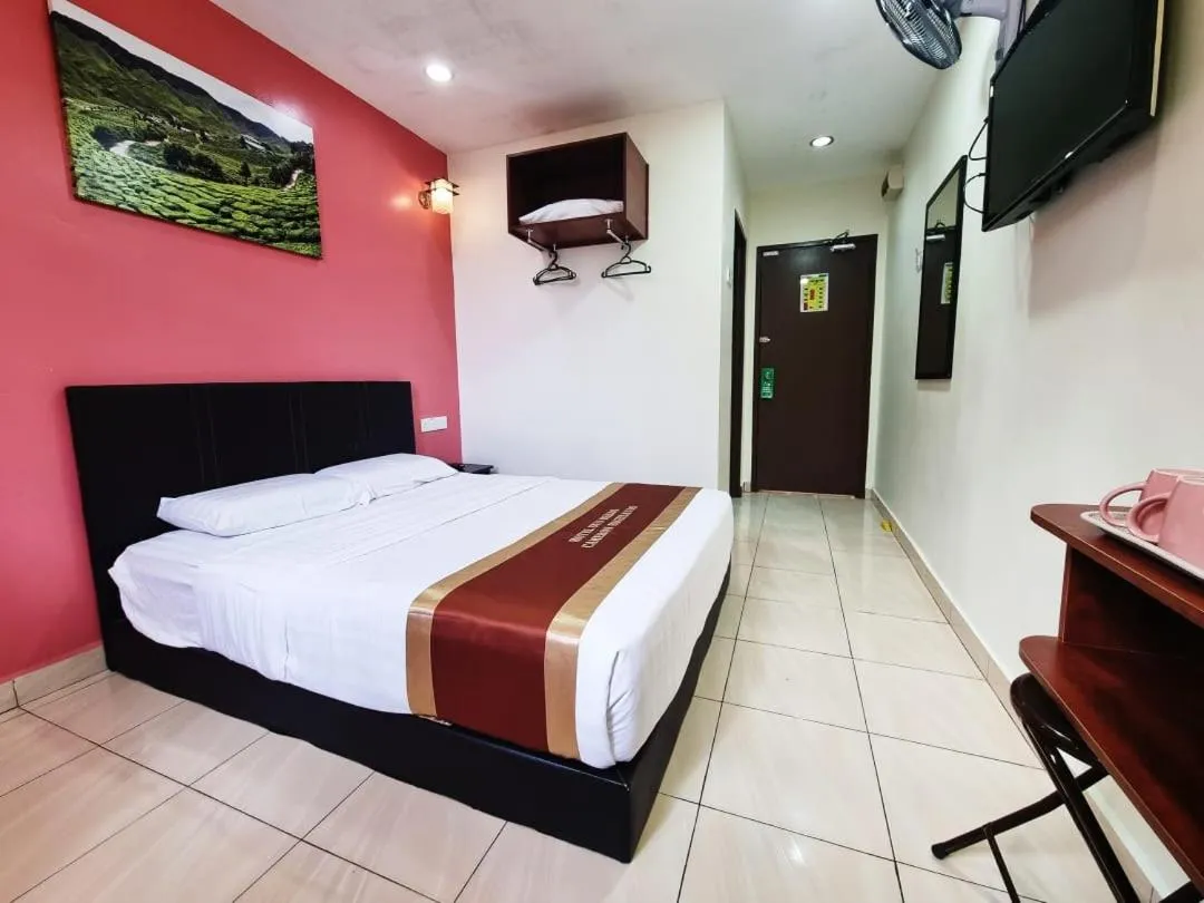 Bed in Hotel Sun Birds